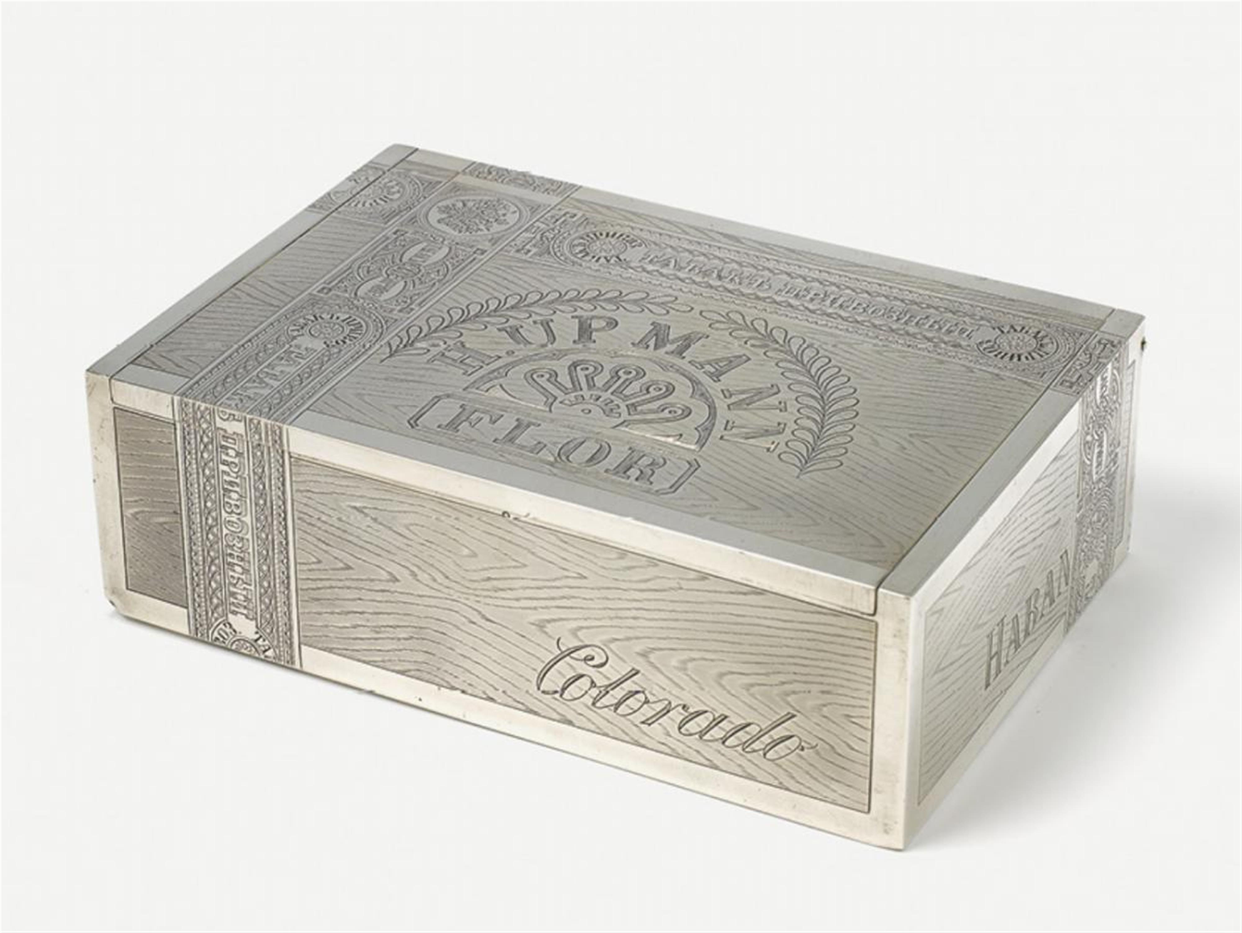 A St. Petersburg silver cigar case. The interior of the lid with an engraved ligatured monogram 'IMB'. One corner slightly dented. Marks of Alexander Lokin, 1886. - image-1