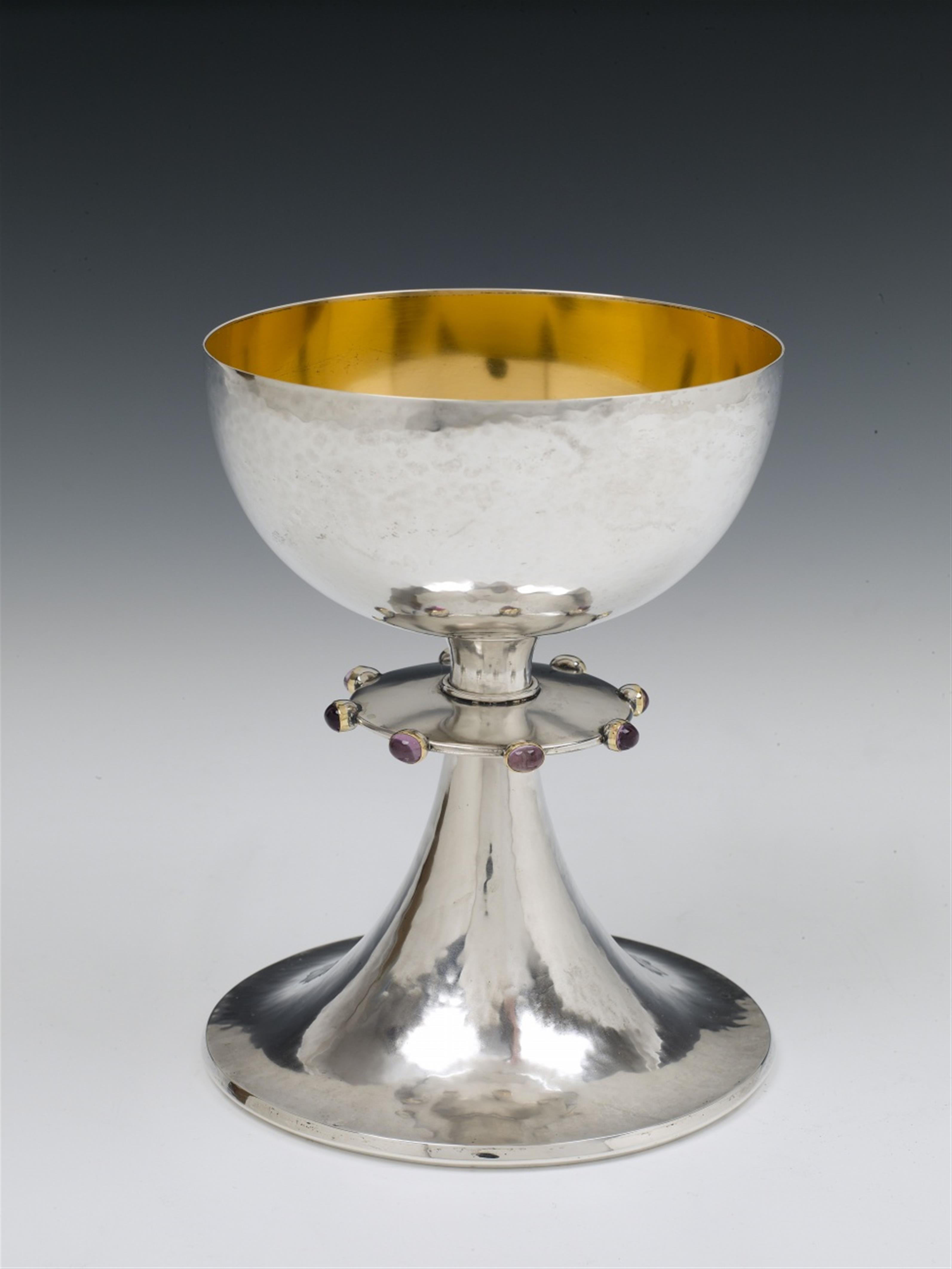 A Cologne silver interior gilt communion chalice. Set with eight amethyst cabochons. Marks of Wilhelm Nagel, ca. 1948/49. - image-1