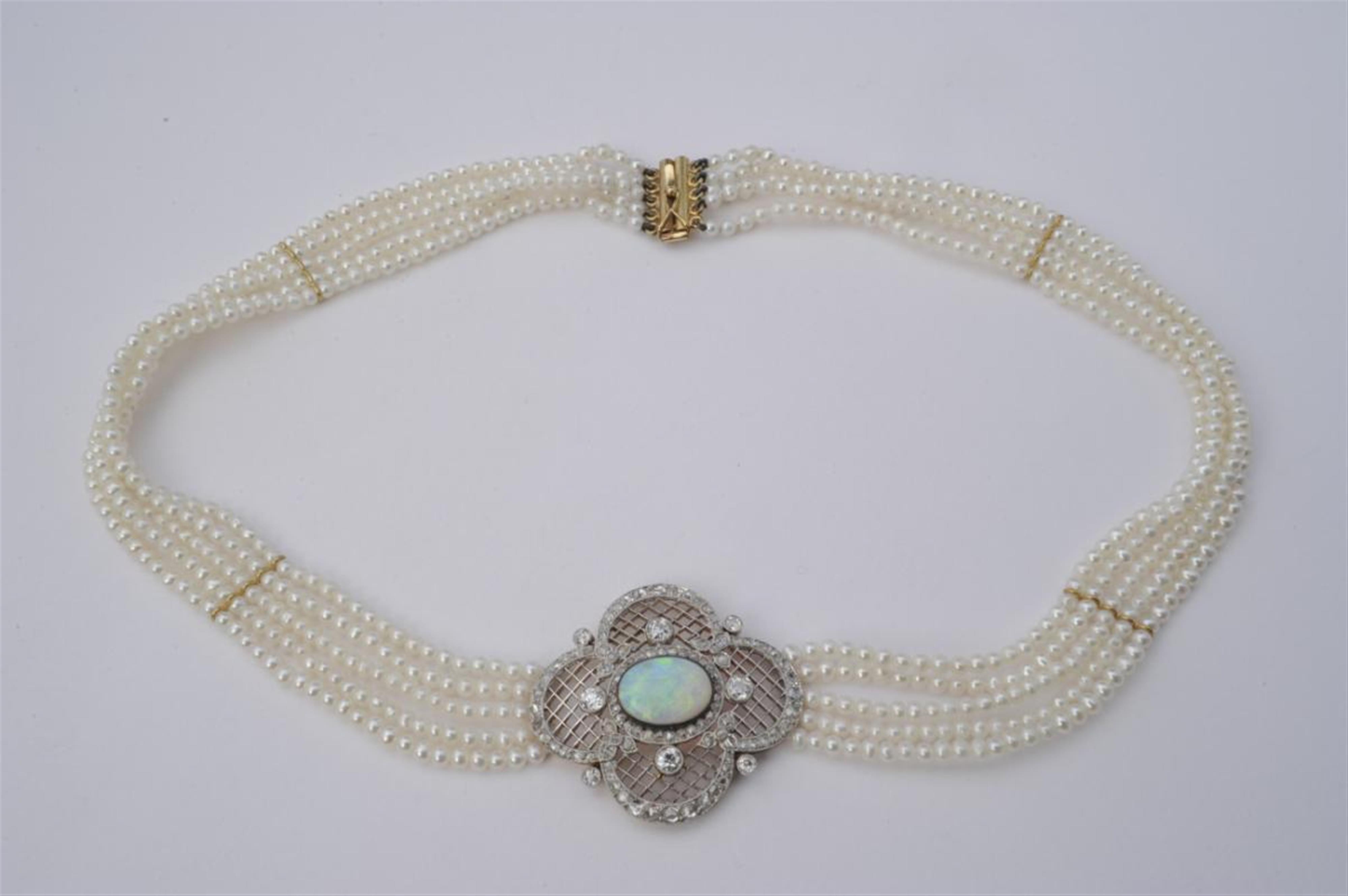 A 14k gold, platinum and cultured pearl choker with an Edwardian buckle - image-1