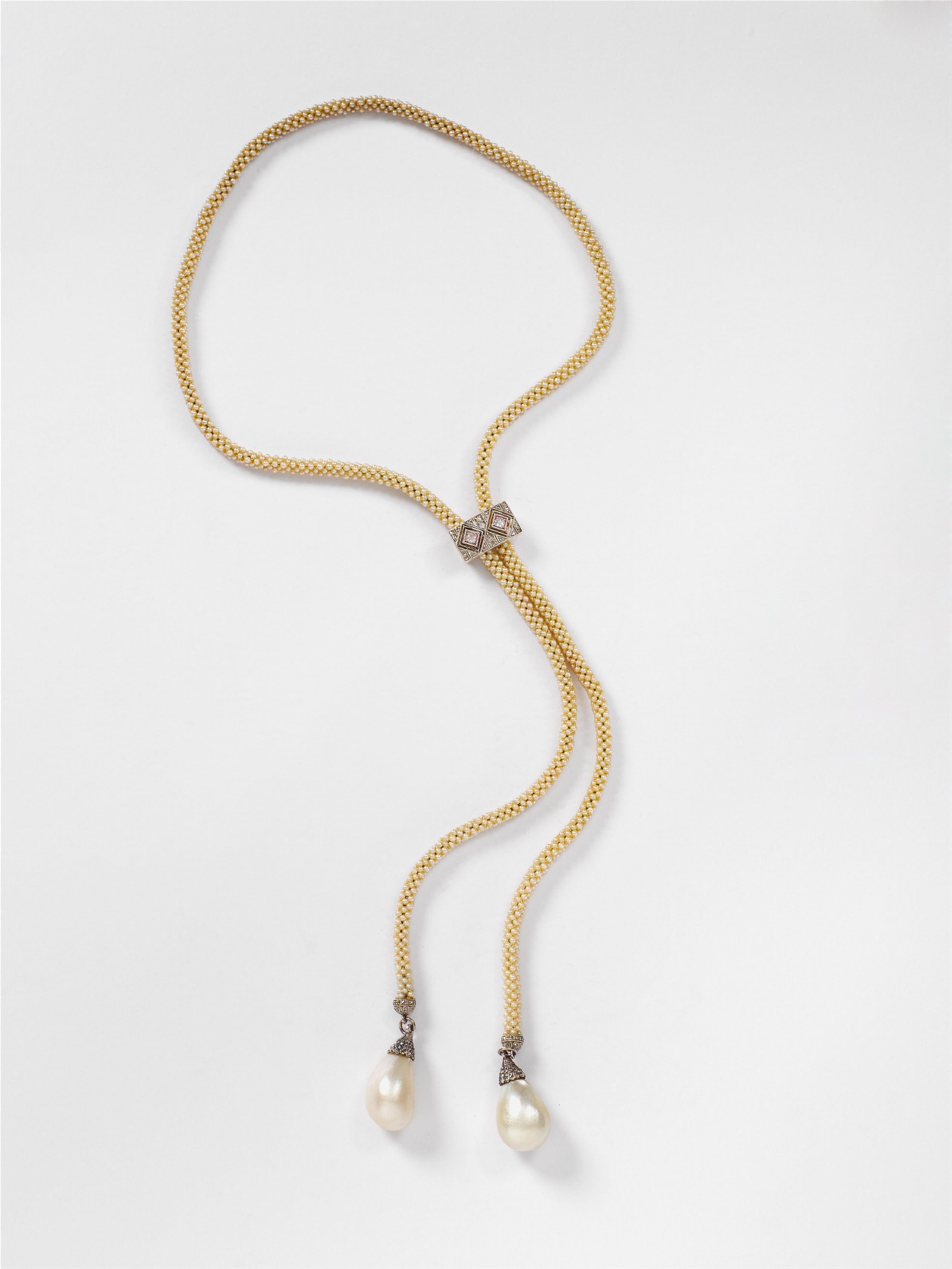 A German 14k gold, silver and Oriental pearl sautoir. - image-1