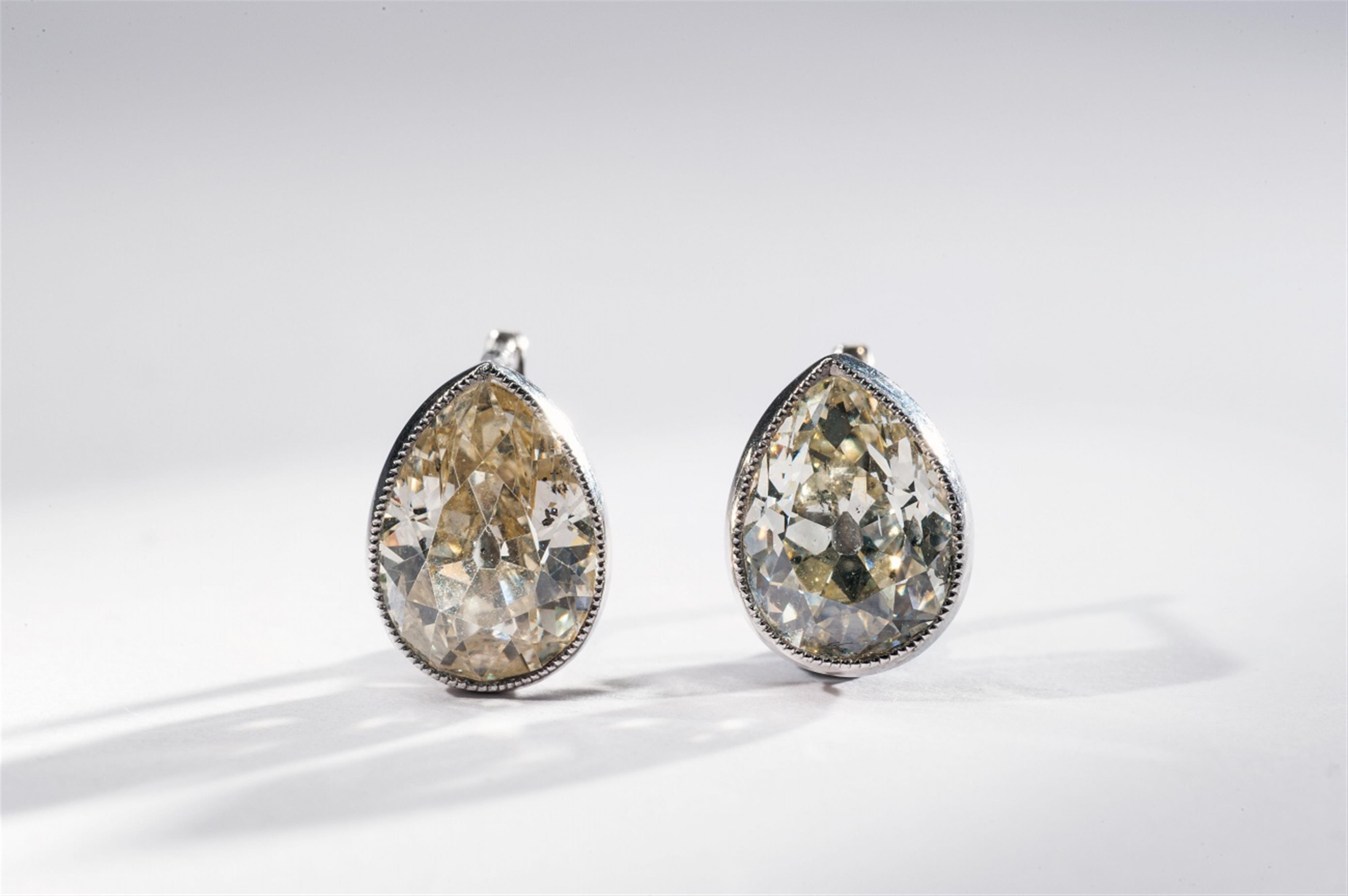A pair of 14k white gold and diamond art déco earrings. - image-2