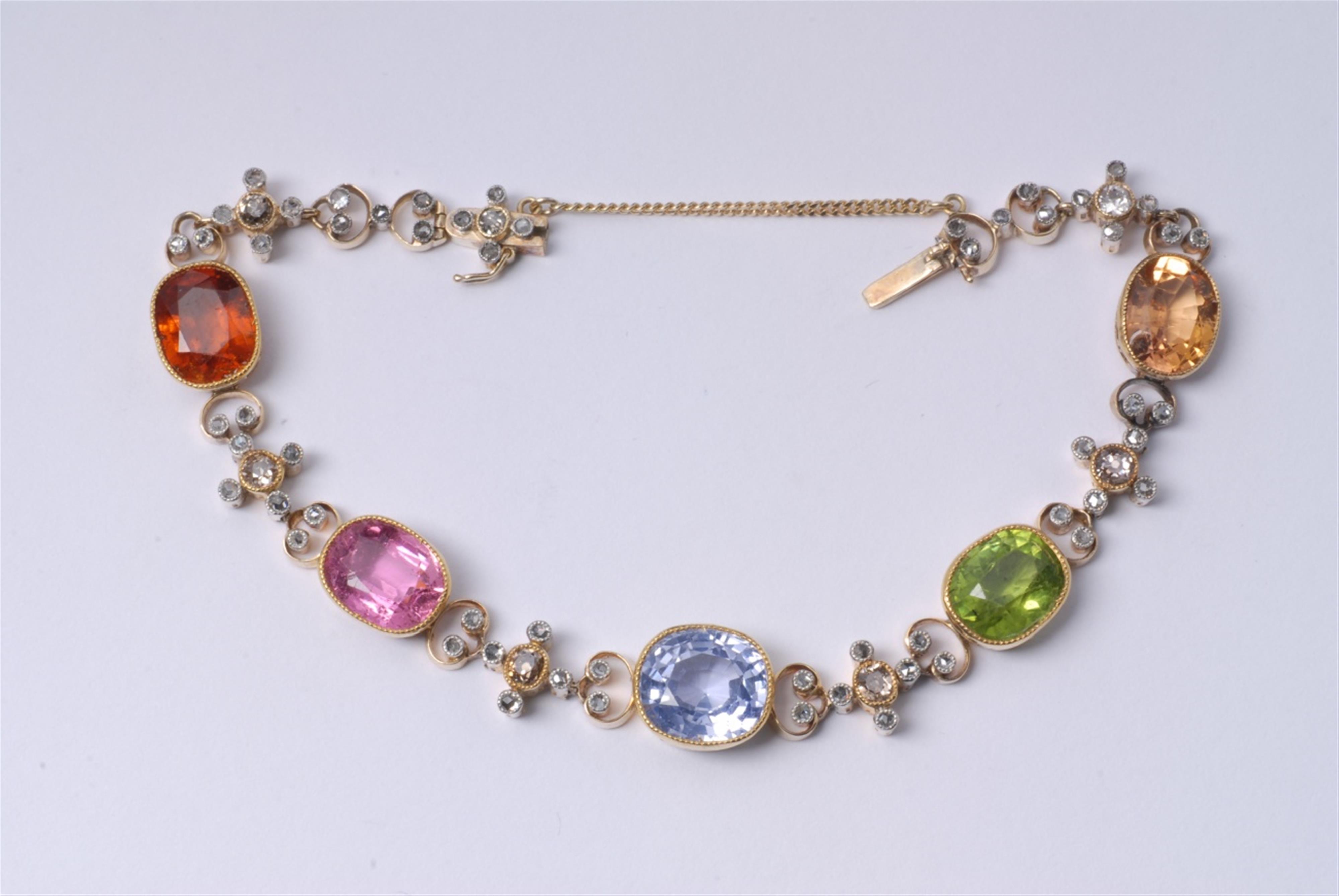A 14k gold belle epoque bracelet with coloured stones. - image-2