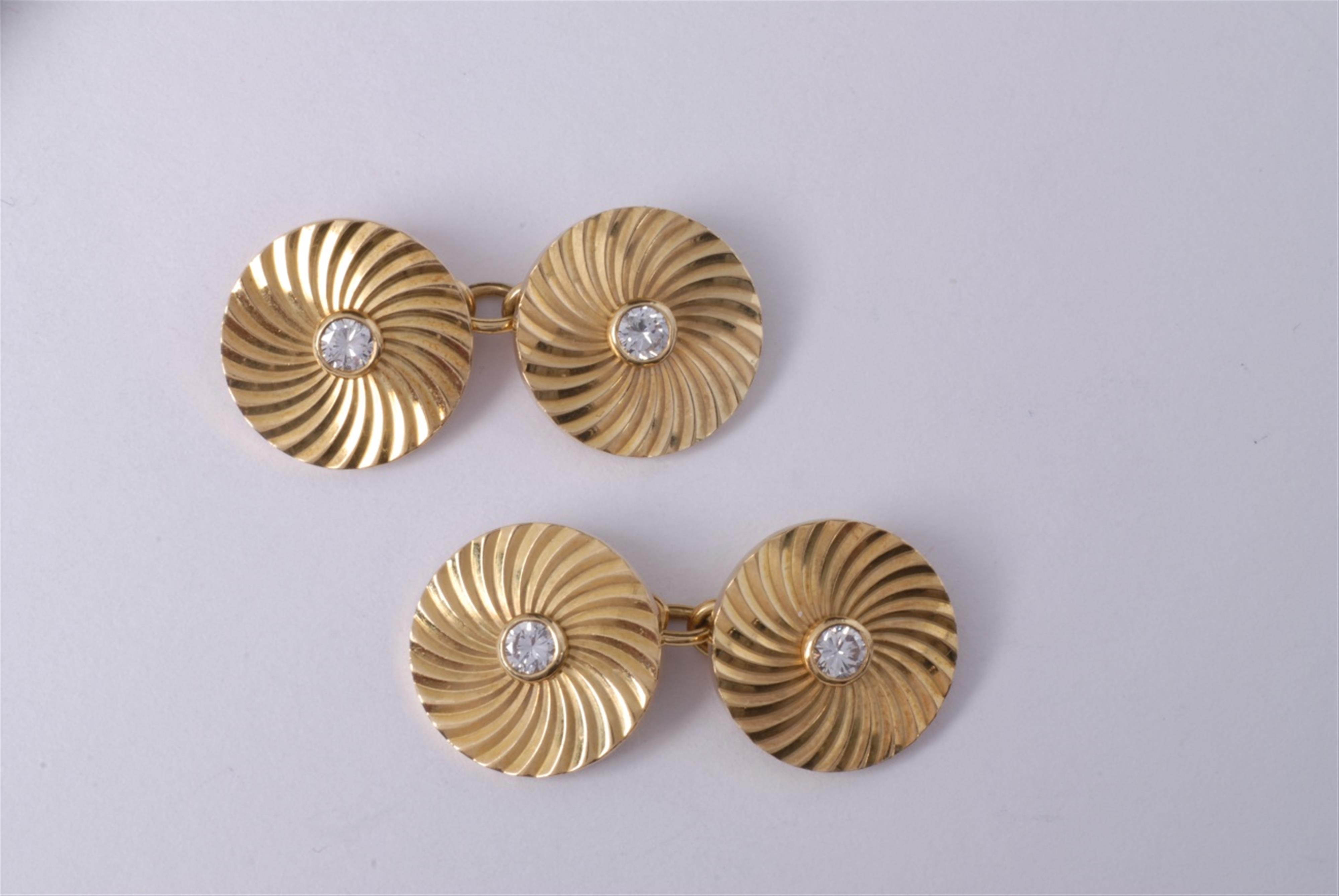 A pair of 18k gold Cartier cufflinks. - image-1