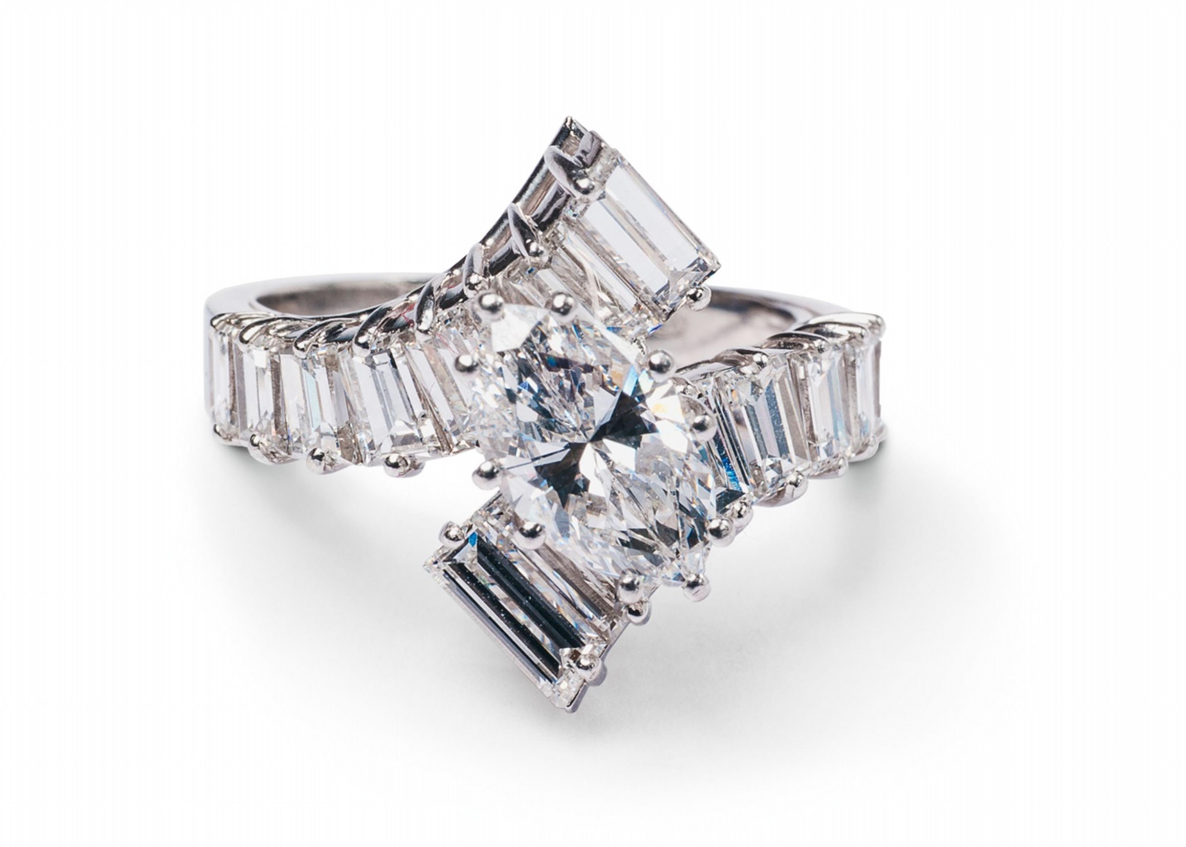 A platinum and diamond crossover ring - image-2