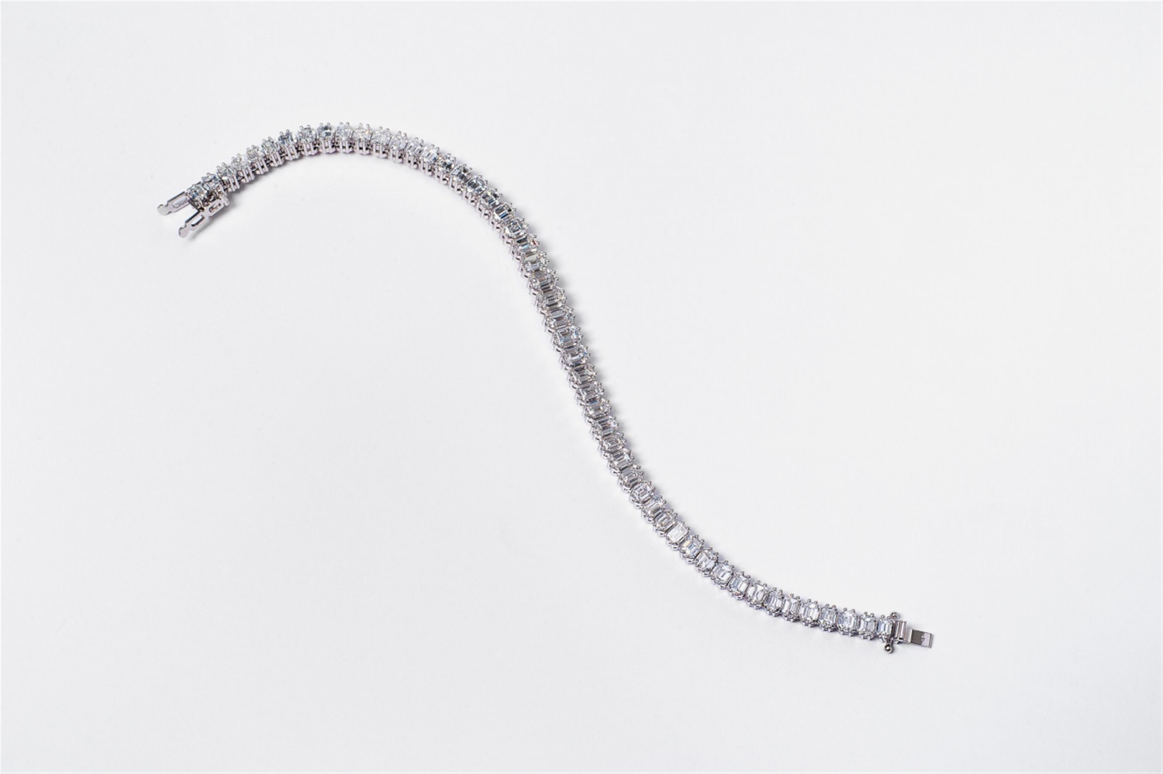 A platinum and diamond riviera bracelet - image-1