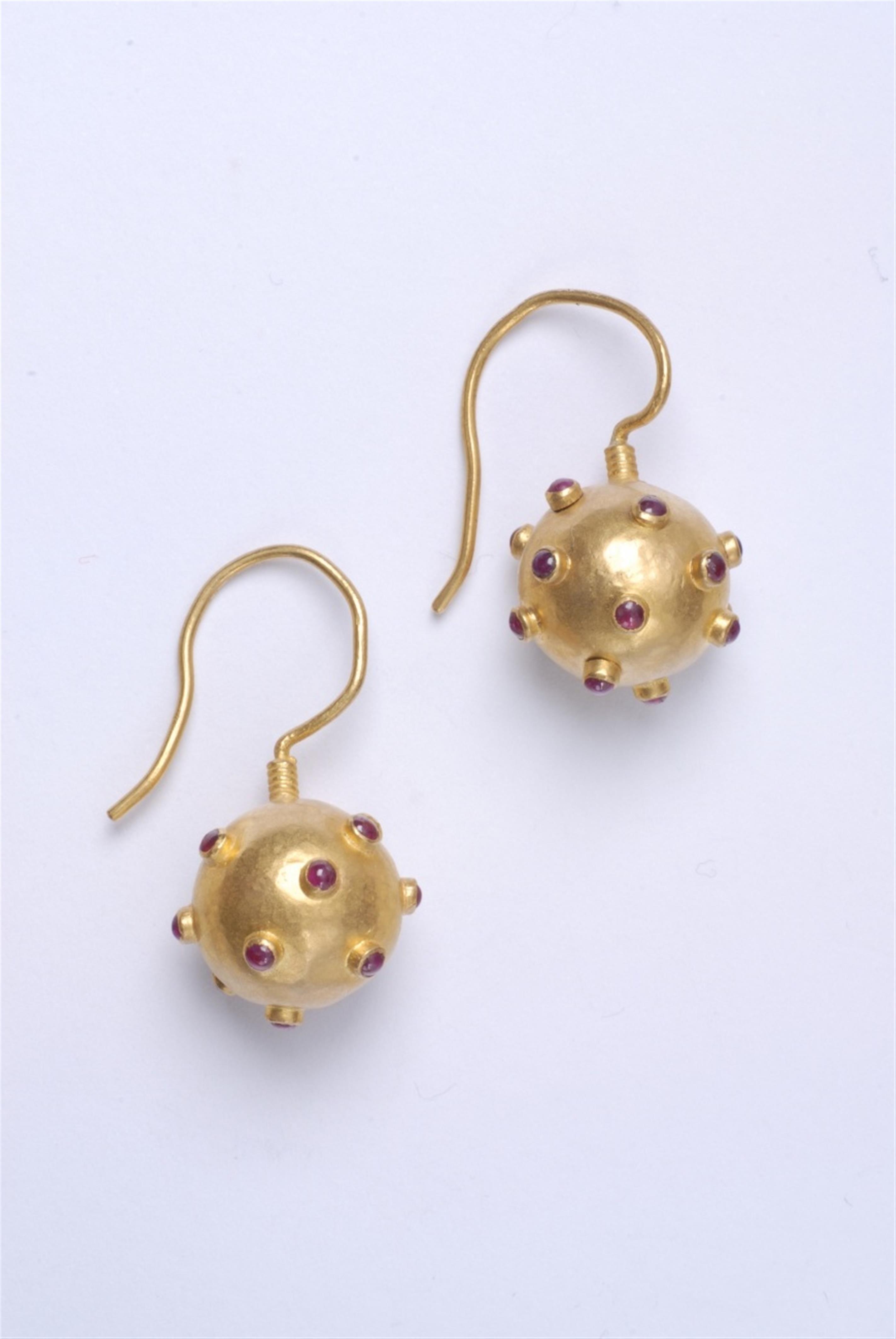 A pair of hand forged 24k gold and ruby hook earrings - image-1