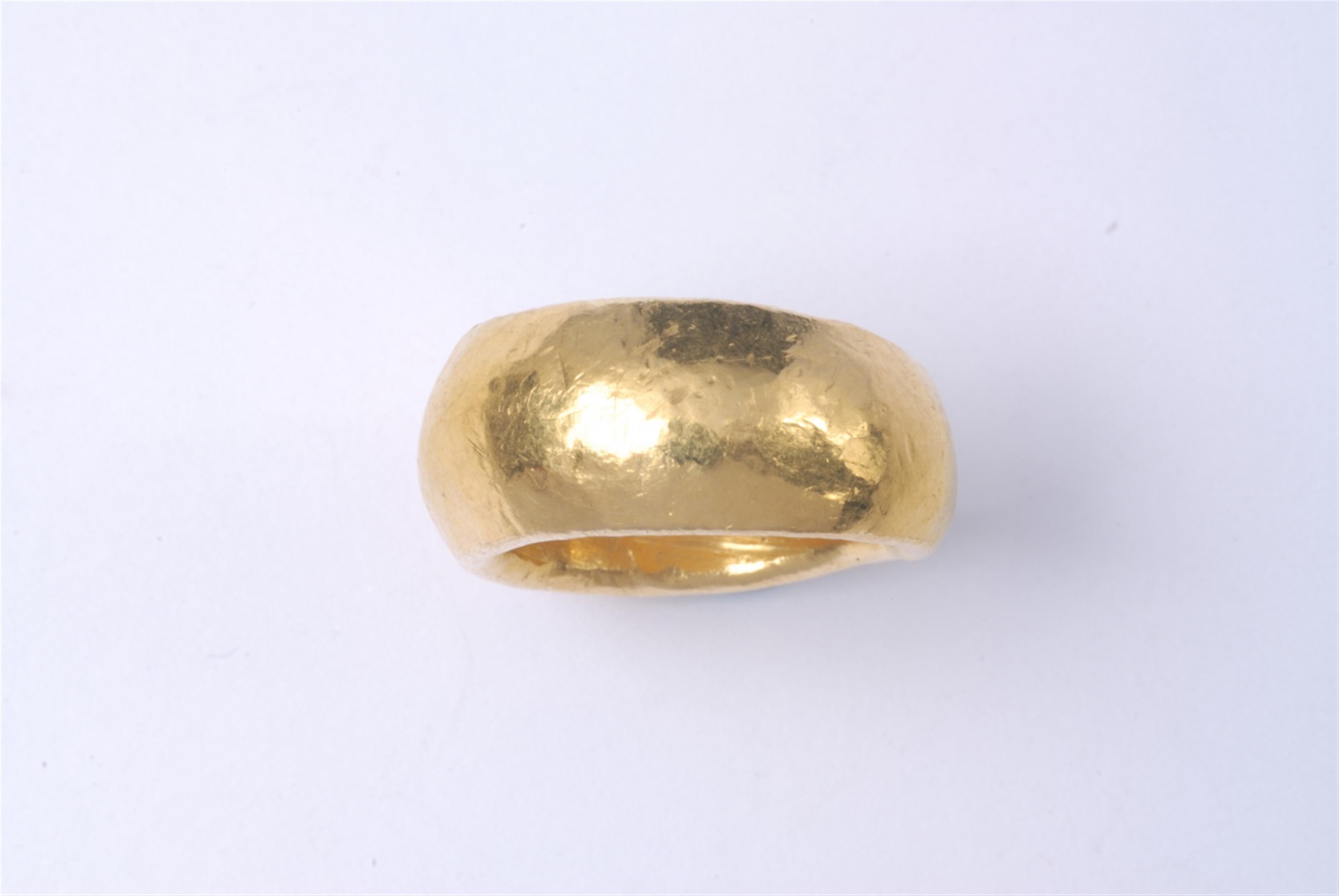 A hand forged 24k gold ring. - image-1