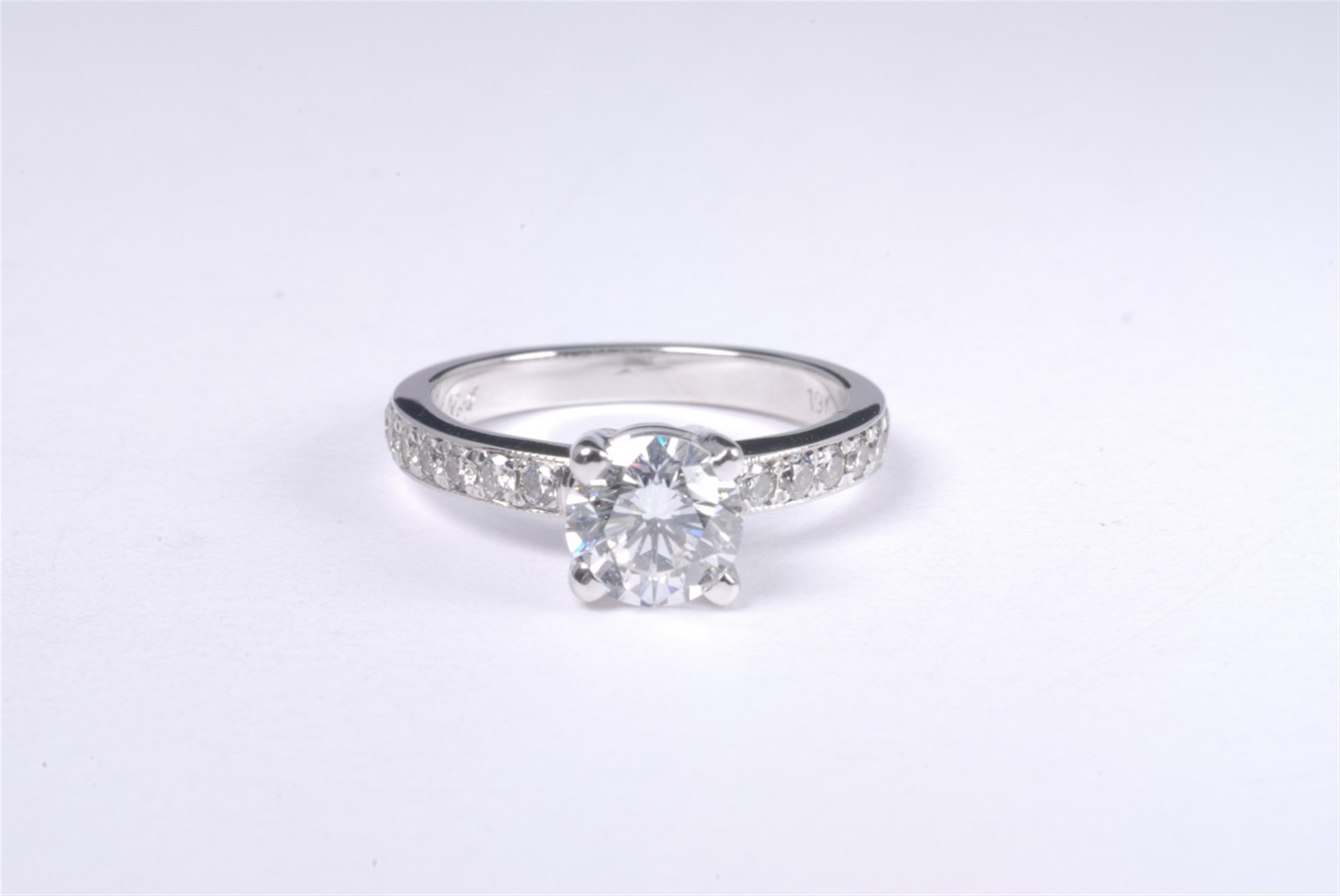 A Canadian 19k white gold eternity ring - image-1