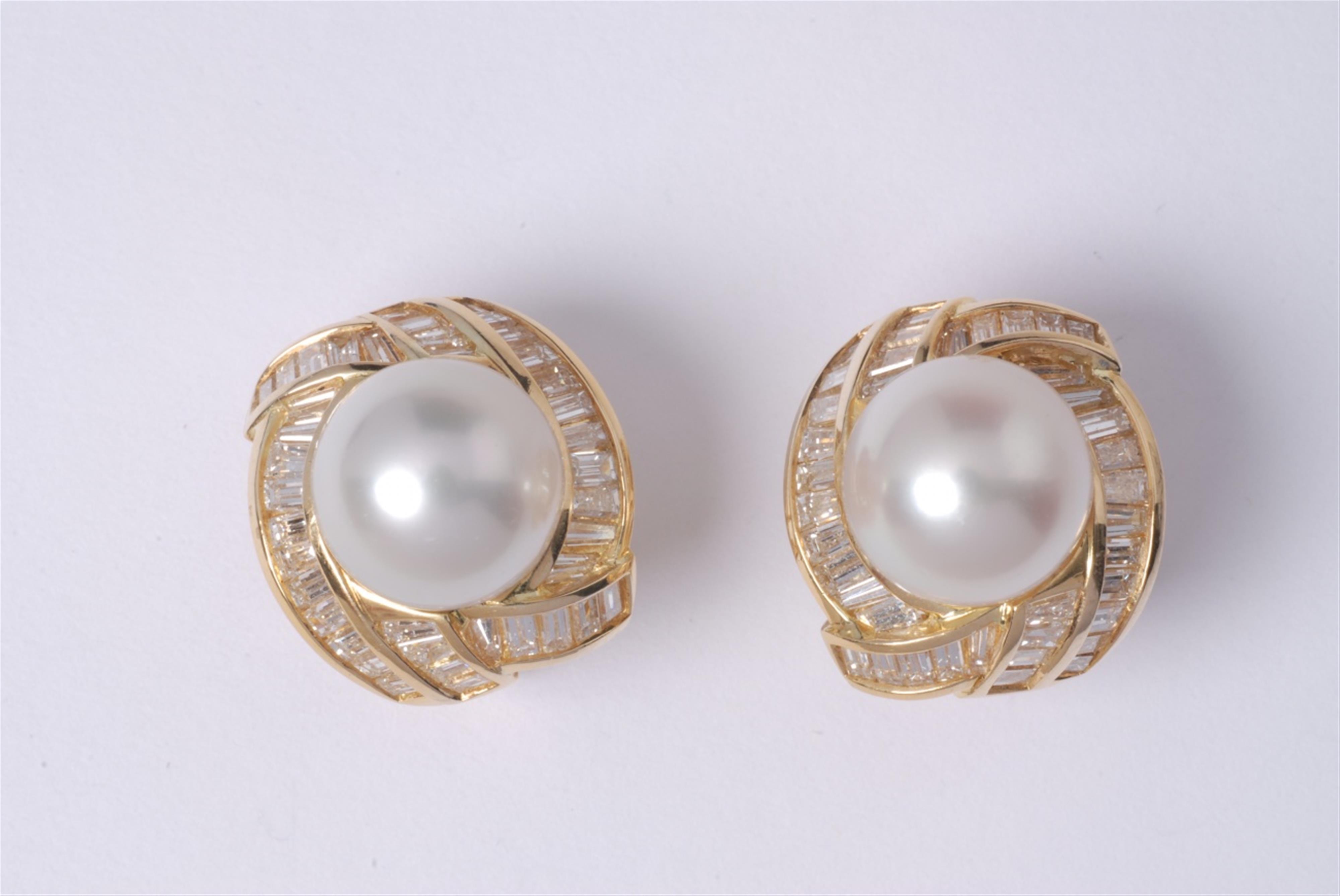 A pair of 18k gold, pearl and diamond earrings. - image-1