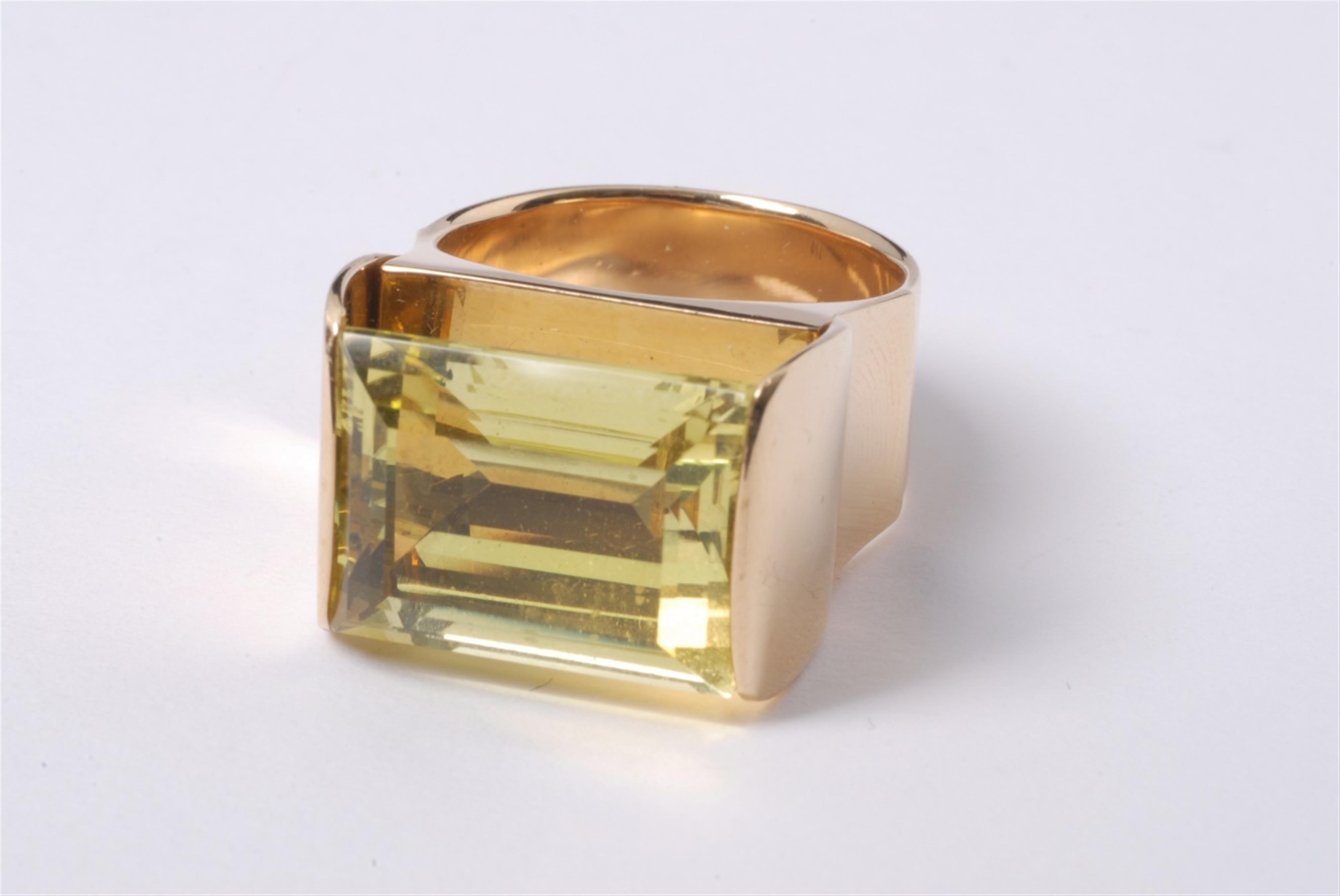 An 18k gold ring with a yellow citrine. - image-1