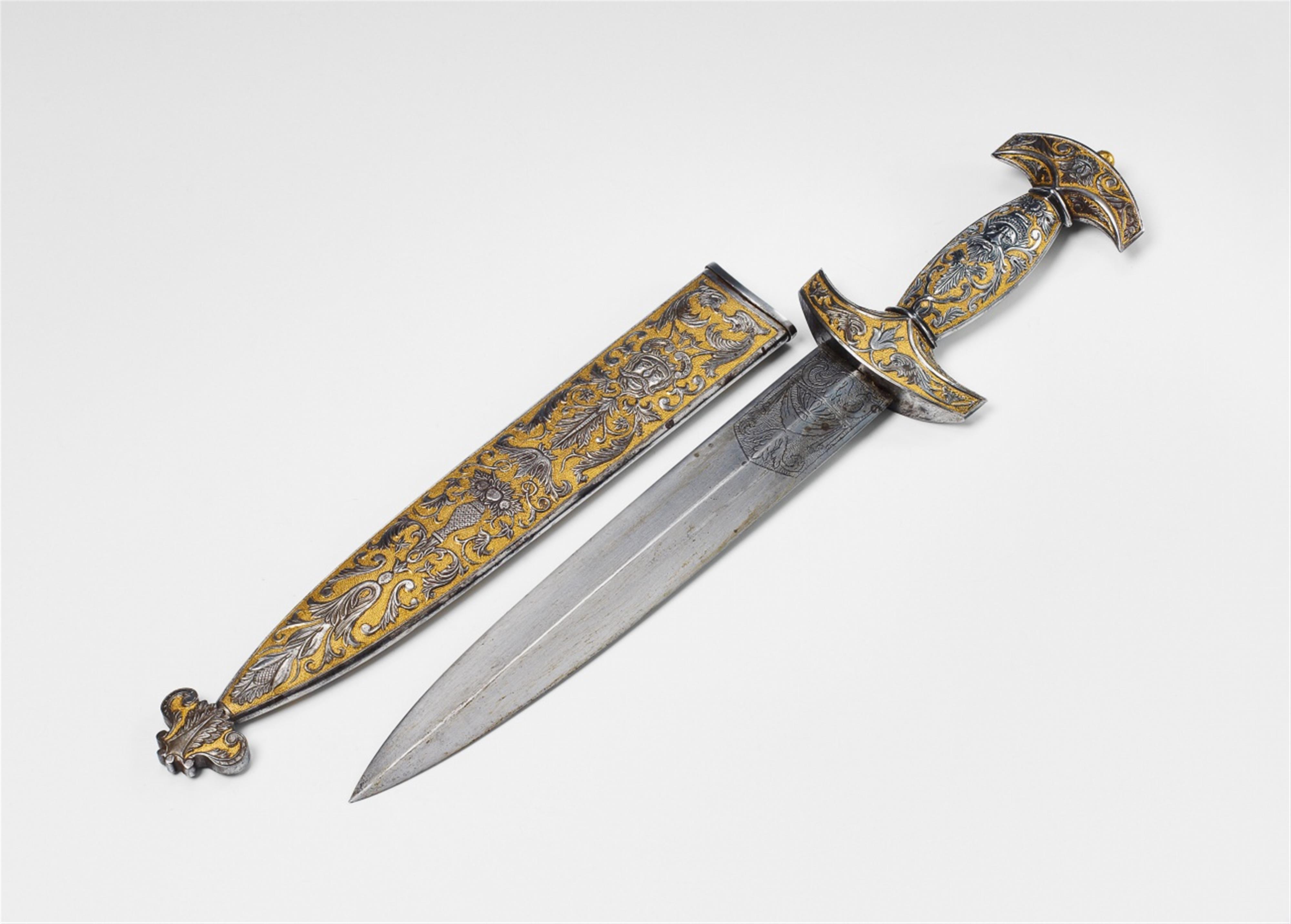 A 19th century gilt and engraved steel Swiss dagger. - image-1