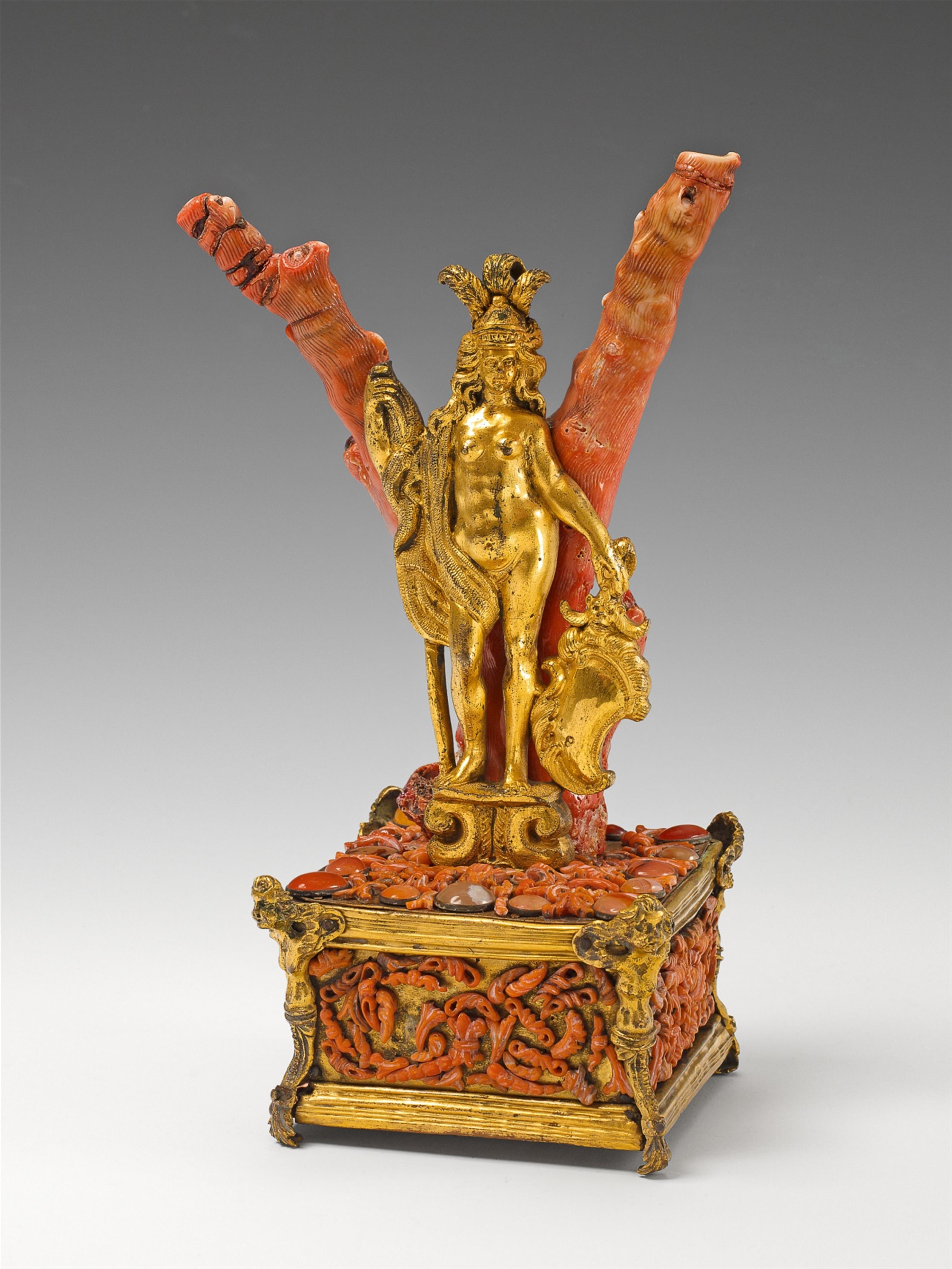 A decorative relief statuette of Athena with coral decor. - image-1