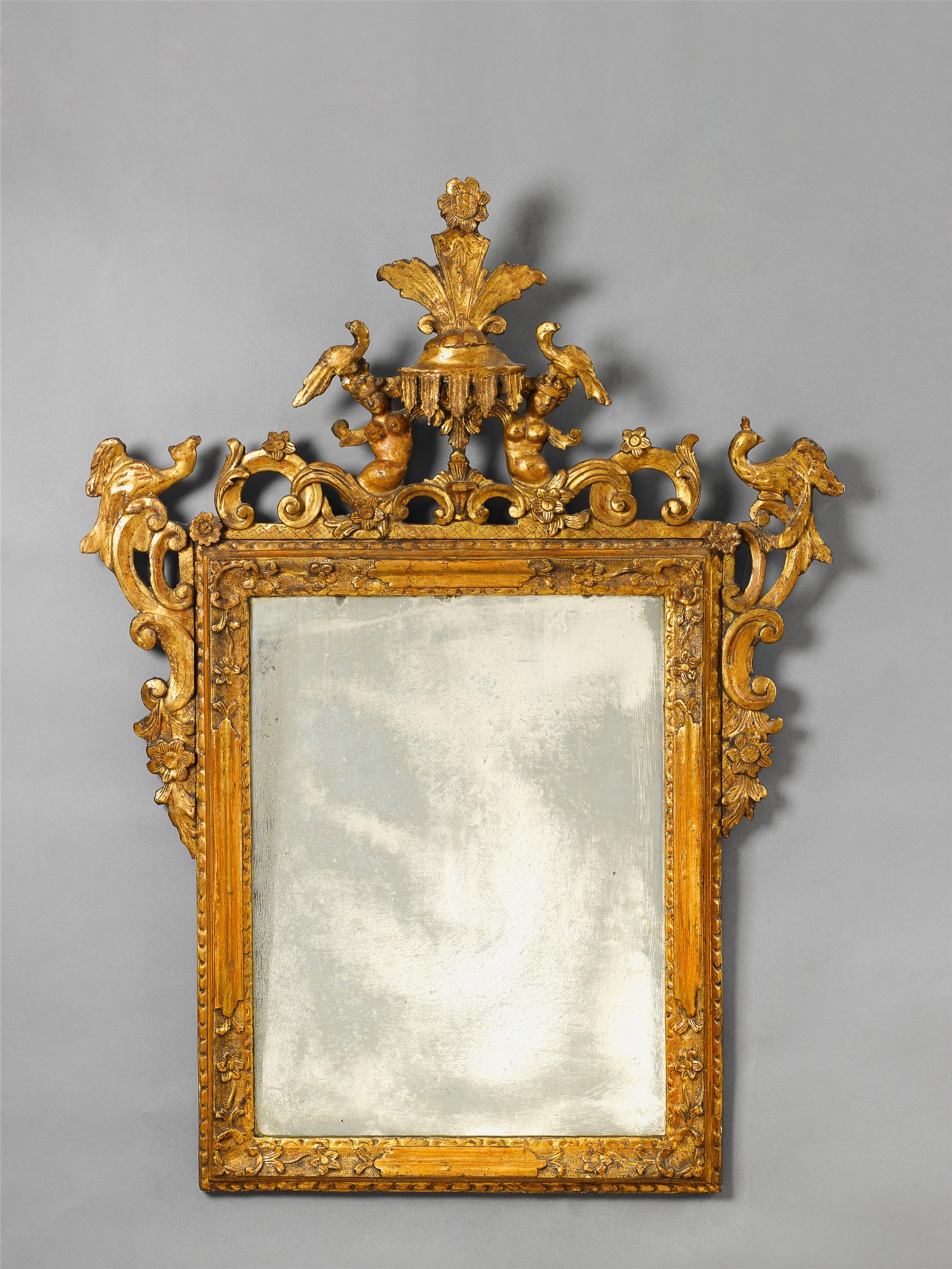 A carved and gilt softwood "specchio veneziano" mirror. - image-1