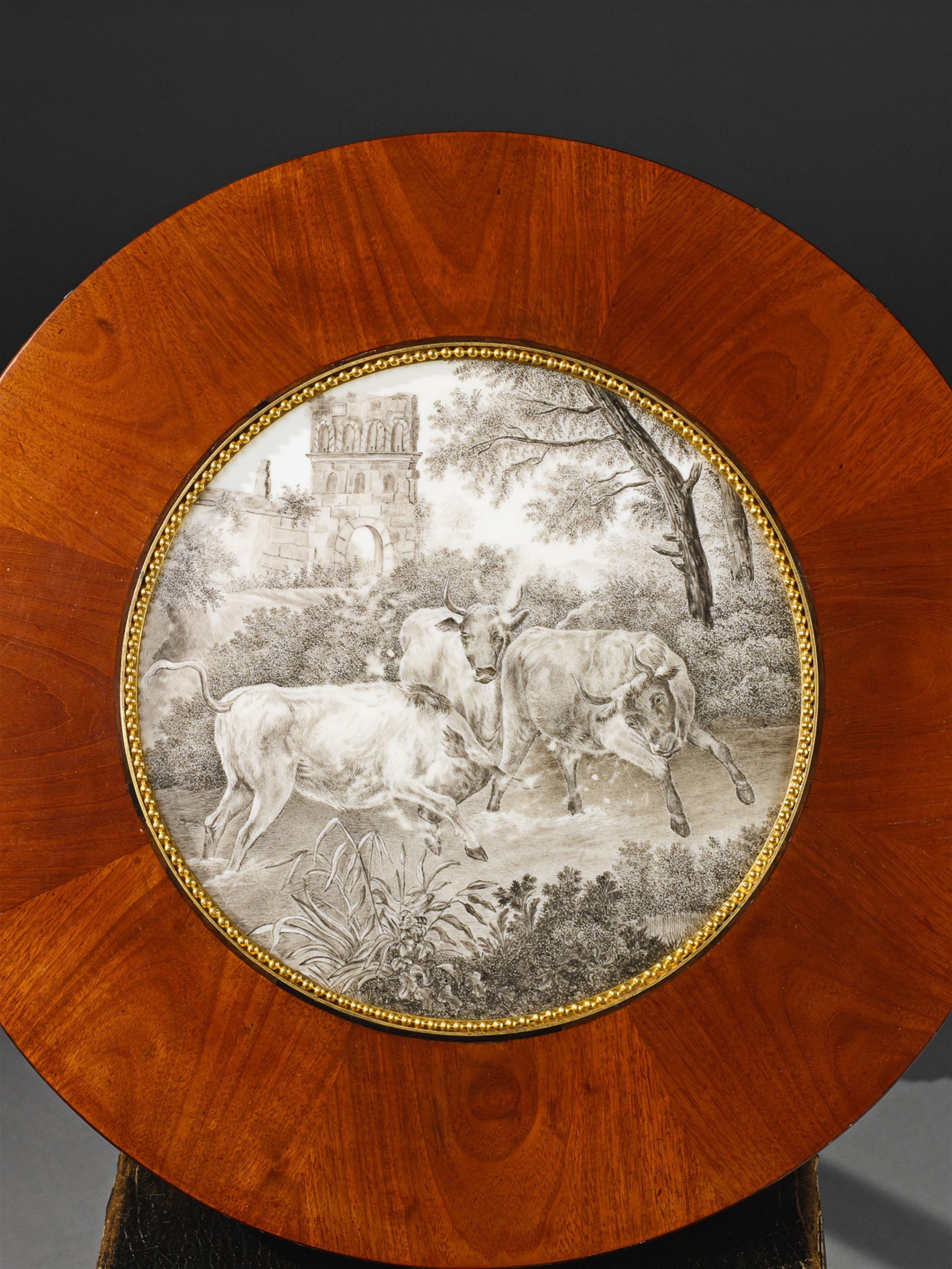 An ormolu mounted mahogany veneer courtly gueridon. - image-2
