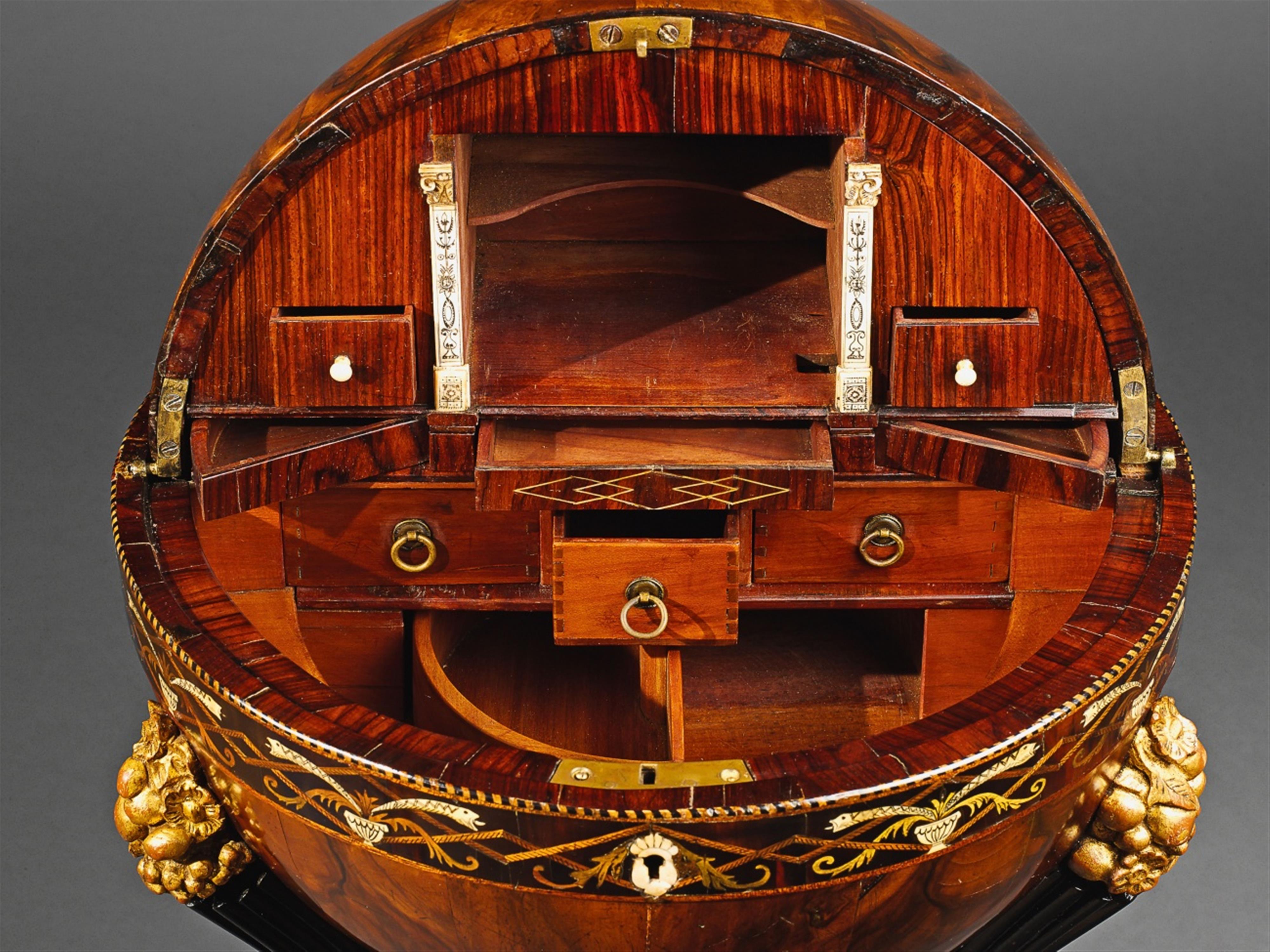 An inlaid walnut globe table. - image-3