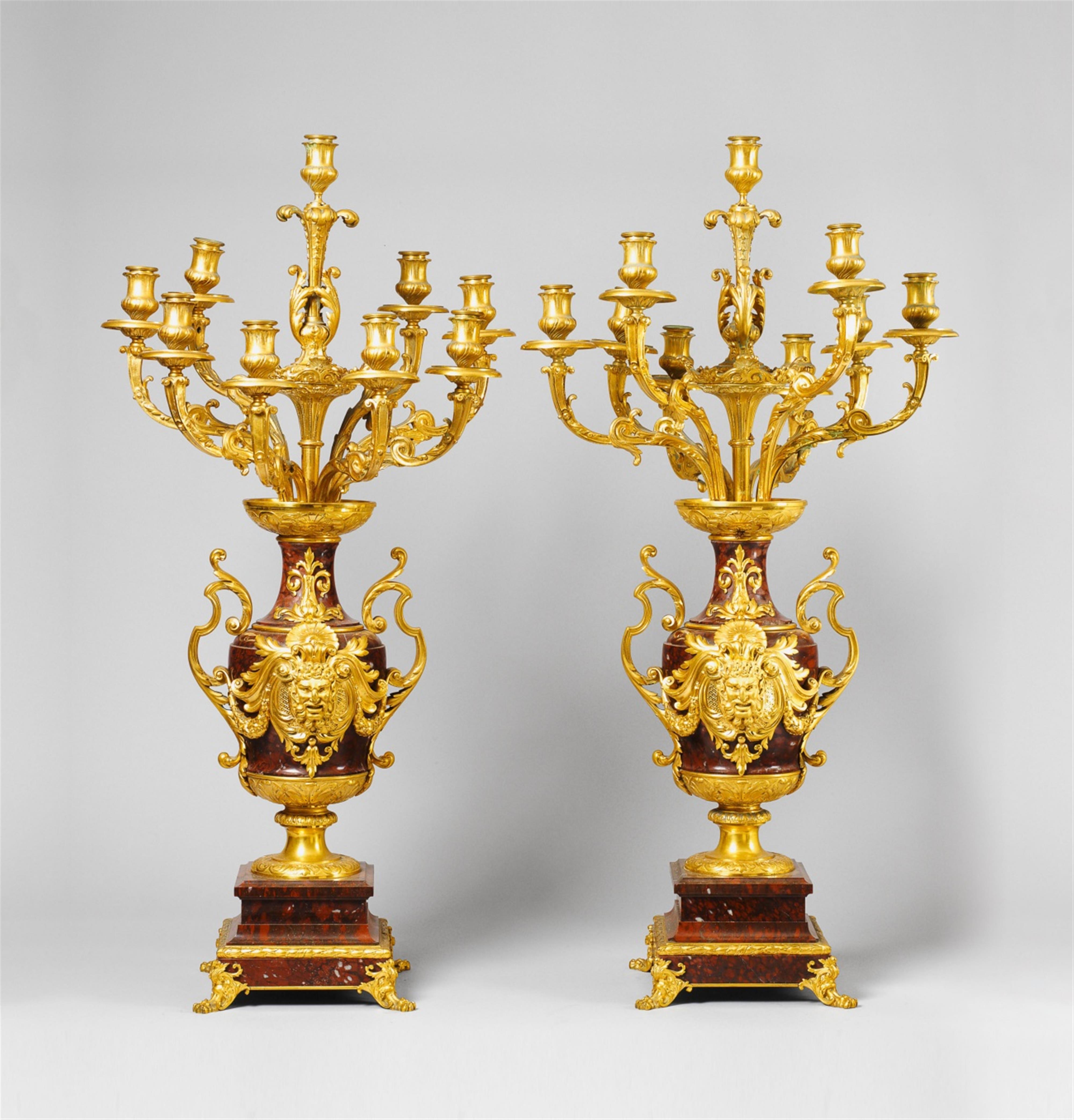 A pair of French gilt bronze and griotte marble candelabra. - image-1