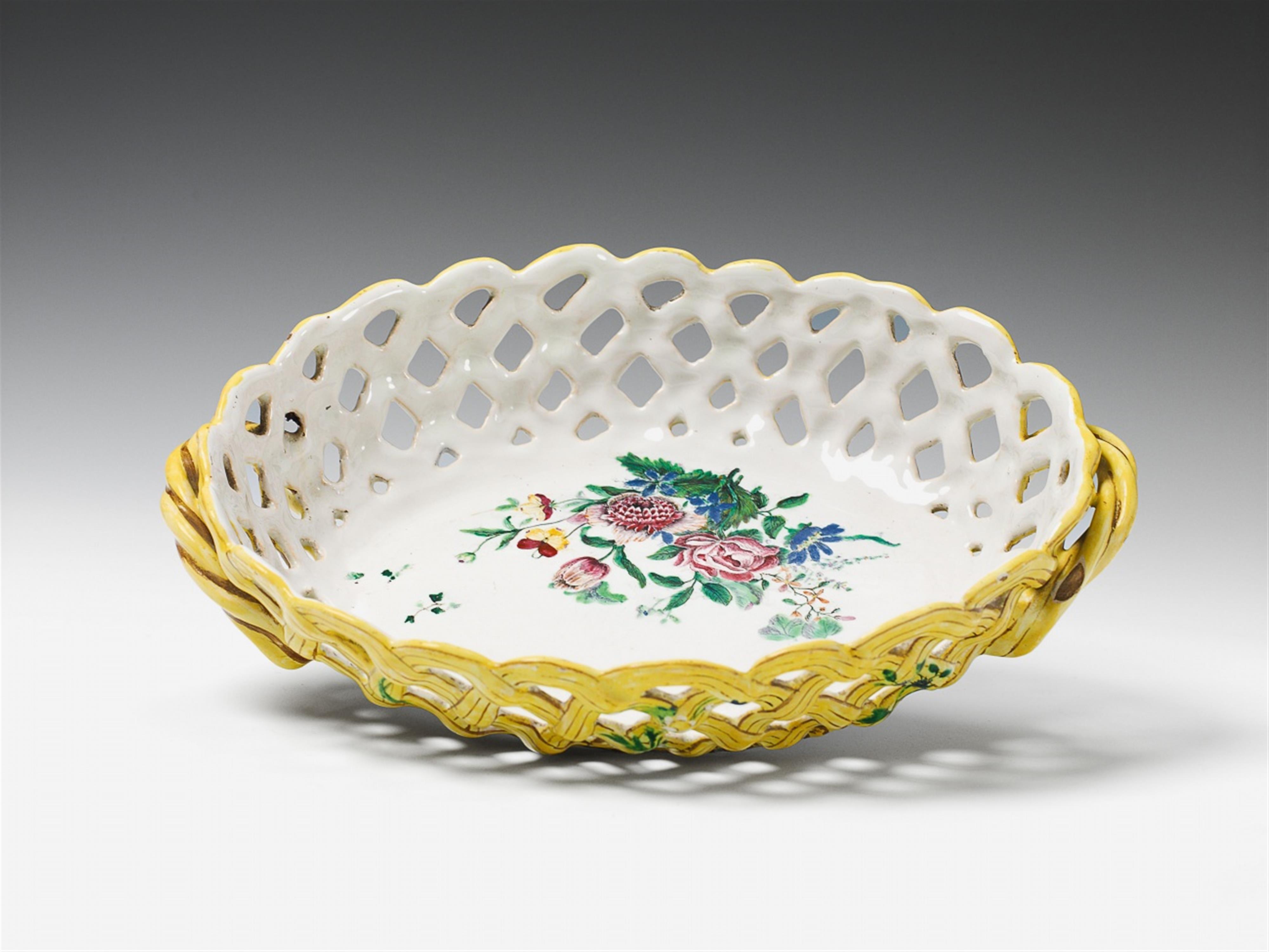 A Schleswig-Holstein faience openwork fruit basket with mixed floral decor. - image-1