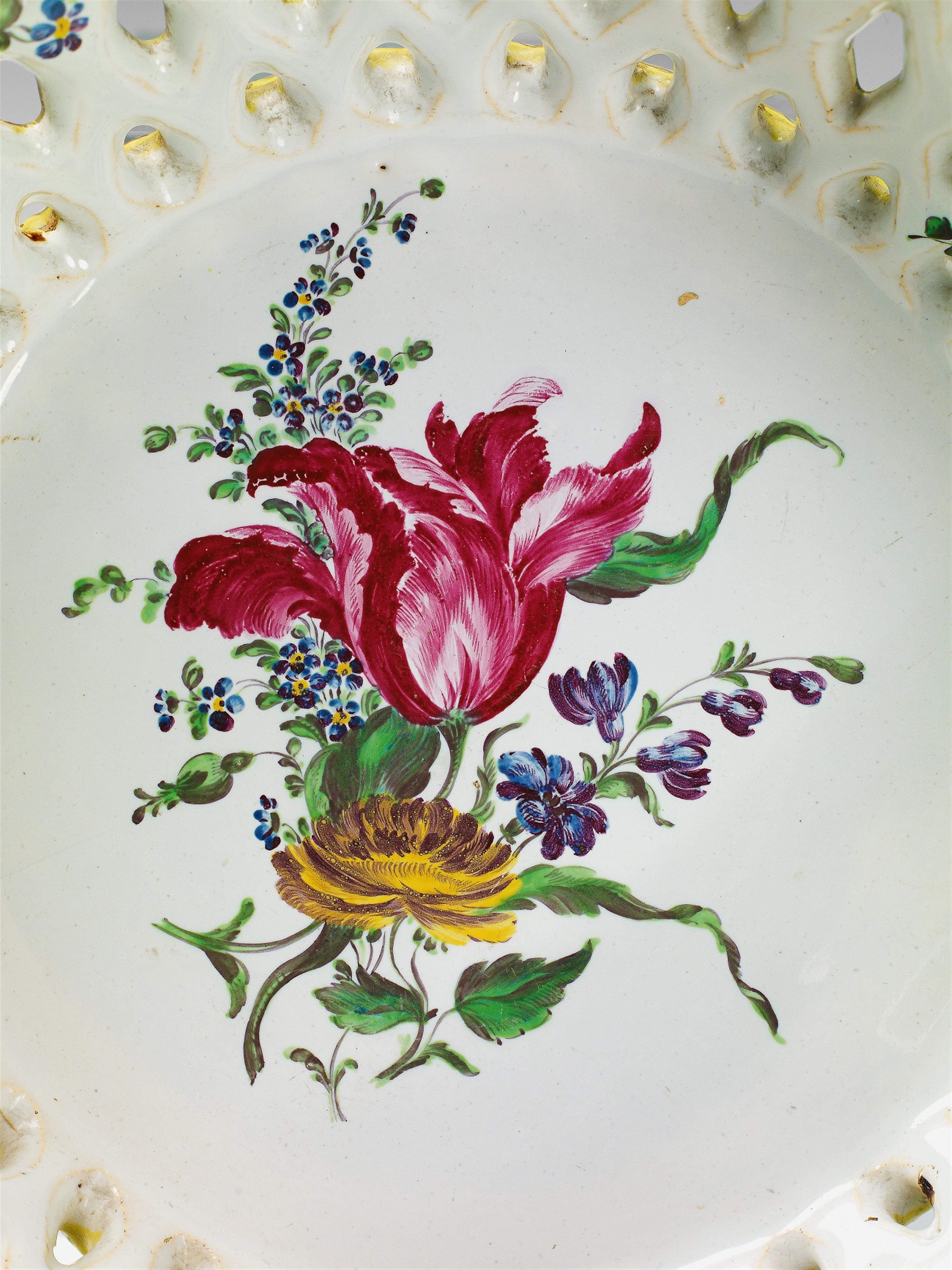 A Strasbourg faience basket and platter with mixed floral decor. - image-2