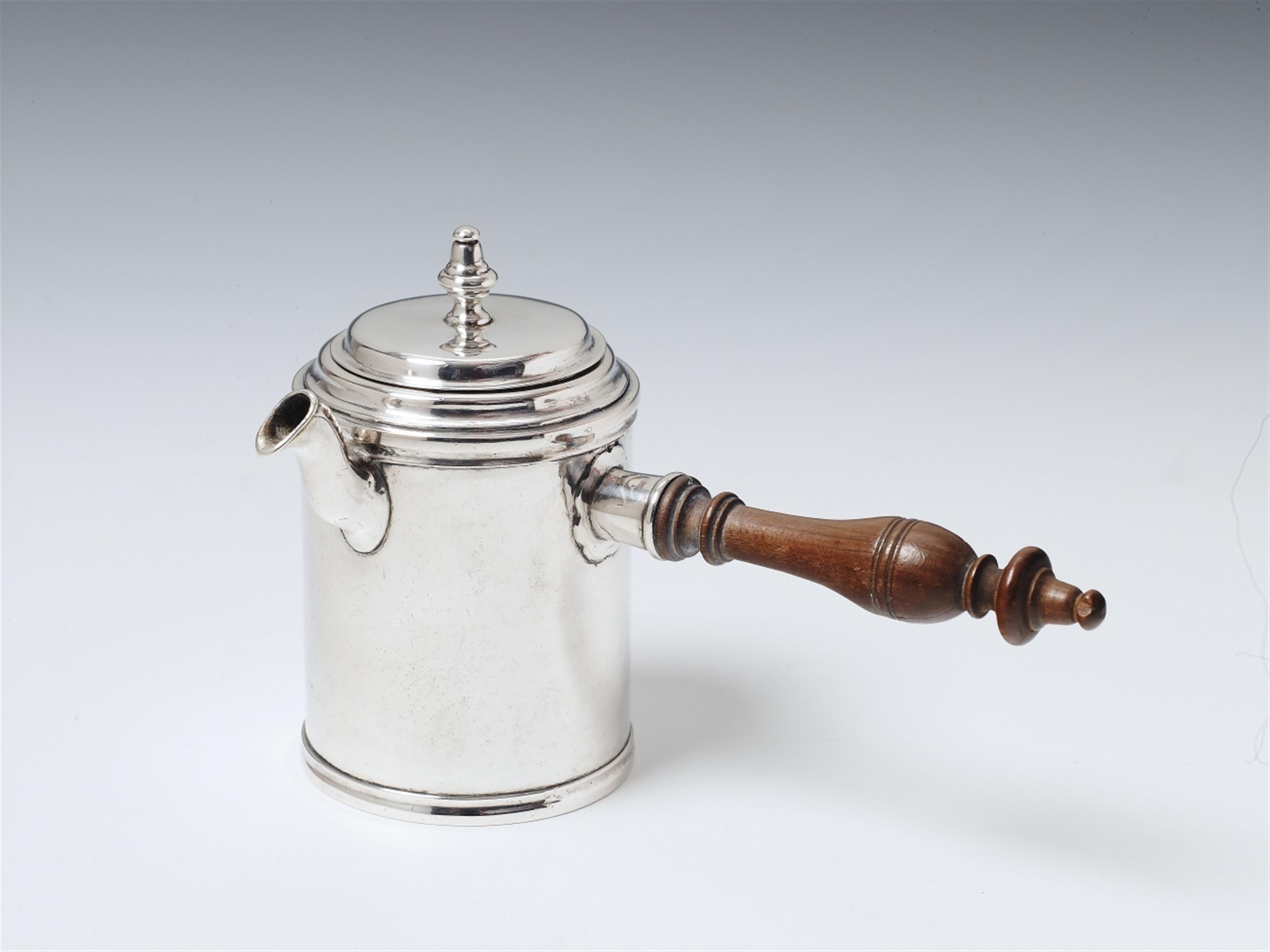 A small Düsseldorf silver interior gilt pitcher. The handle of wood. Marks of Johann Peter Rüdesheim, 1777/78. - image-1