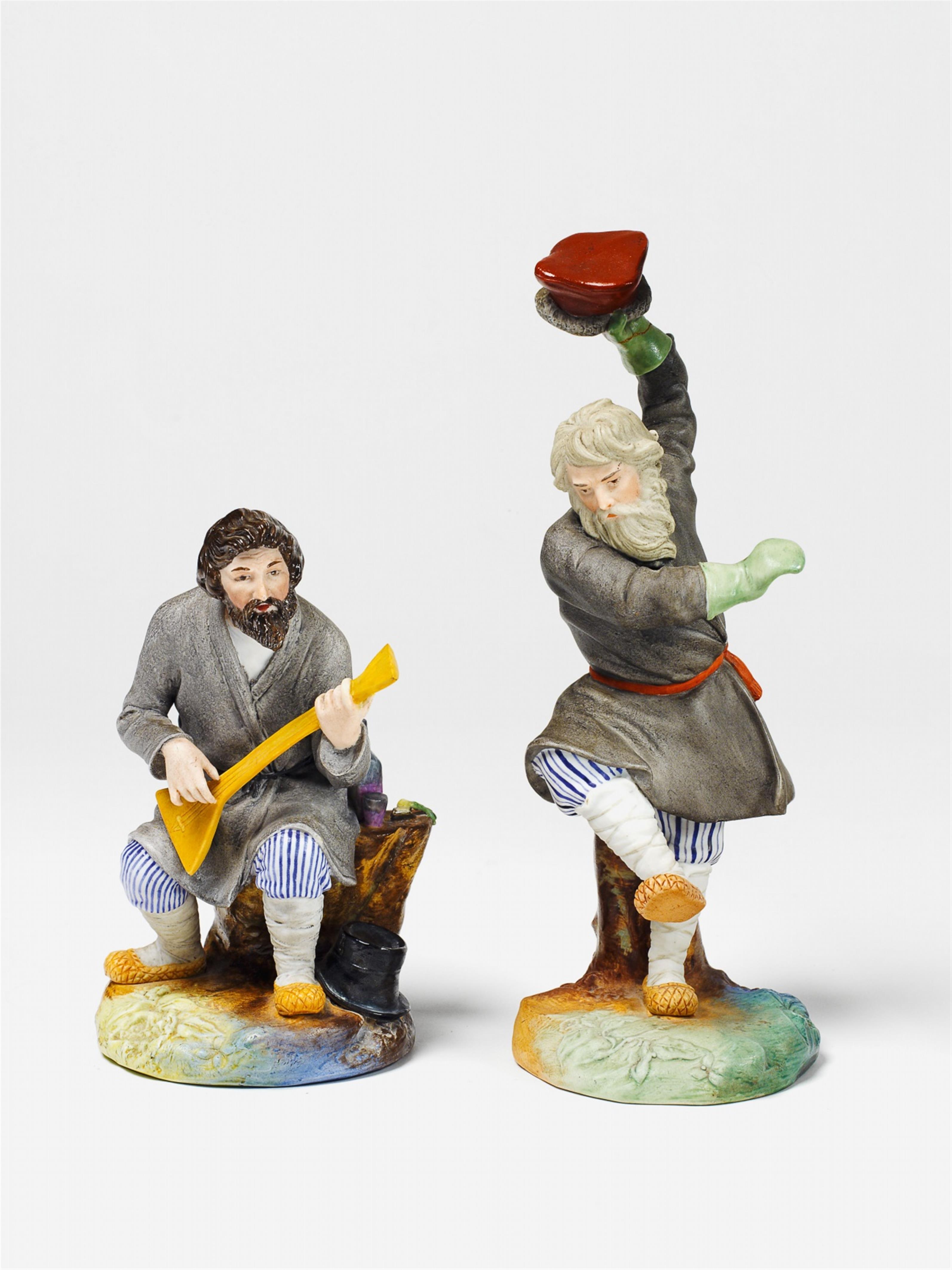 A biscuit porcelain figure of a dancing peasant. - image-1