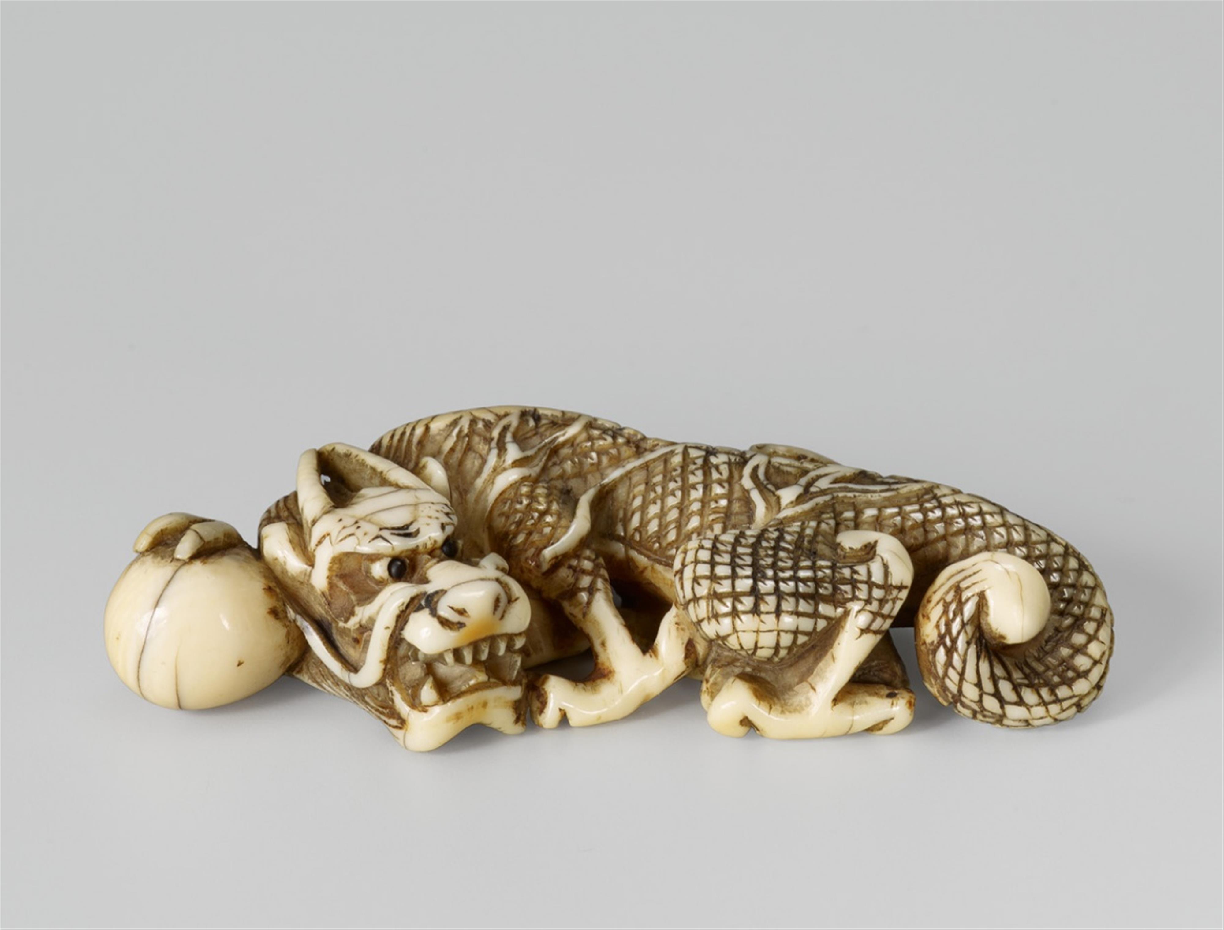 An unusual ivory netsuke of a dragon, by Sekishun. First half 19th century - image-1