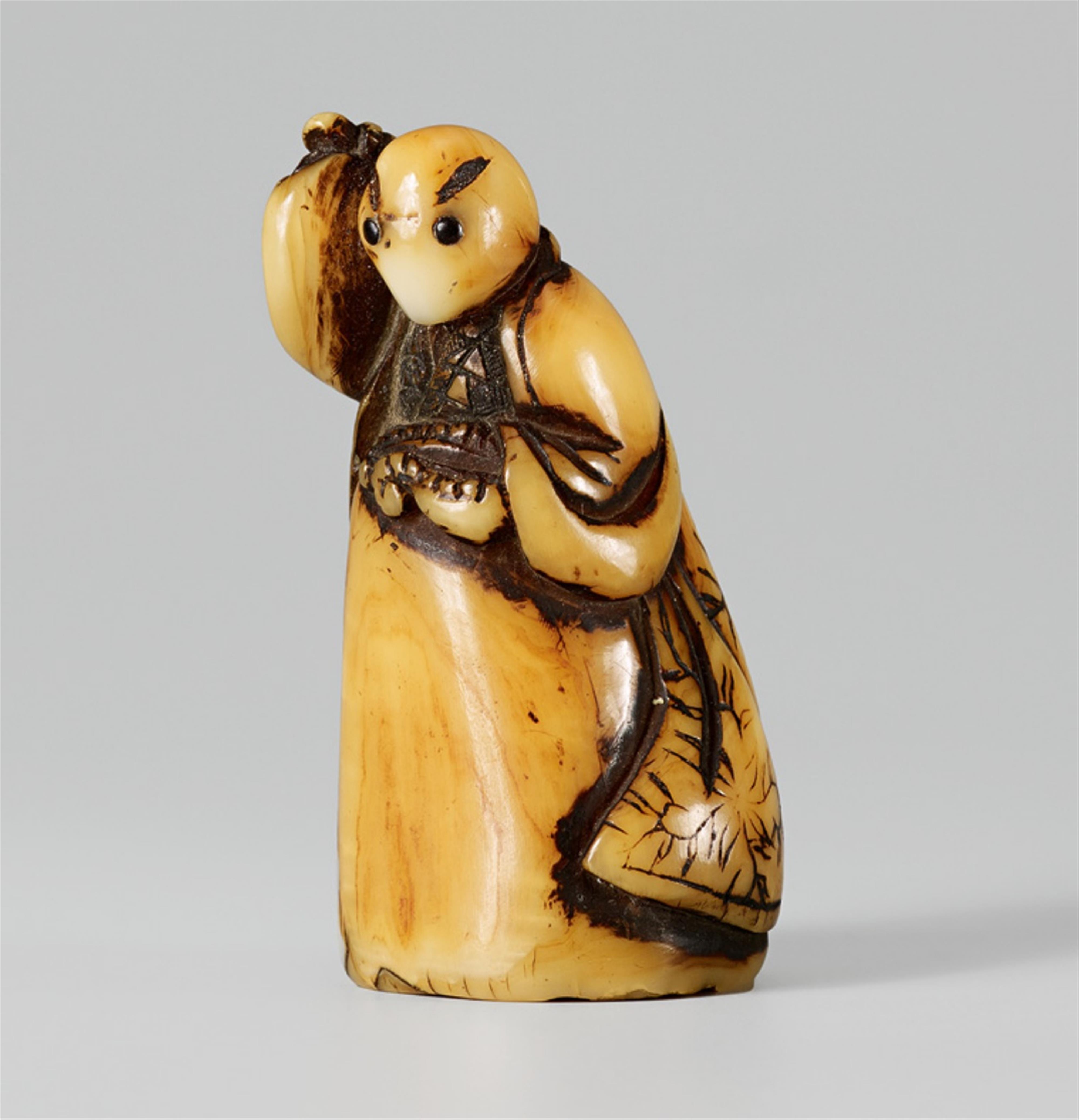 An animal tooth netsuke of an octopus as Kiyohime. 19th century - image-1