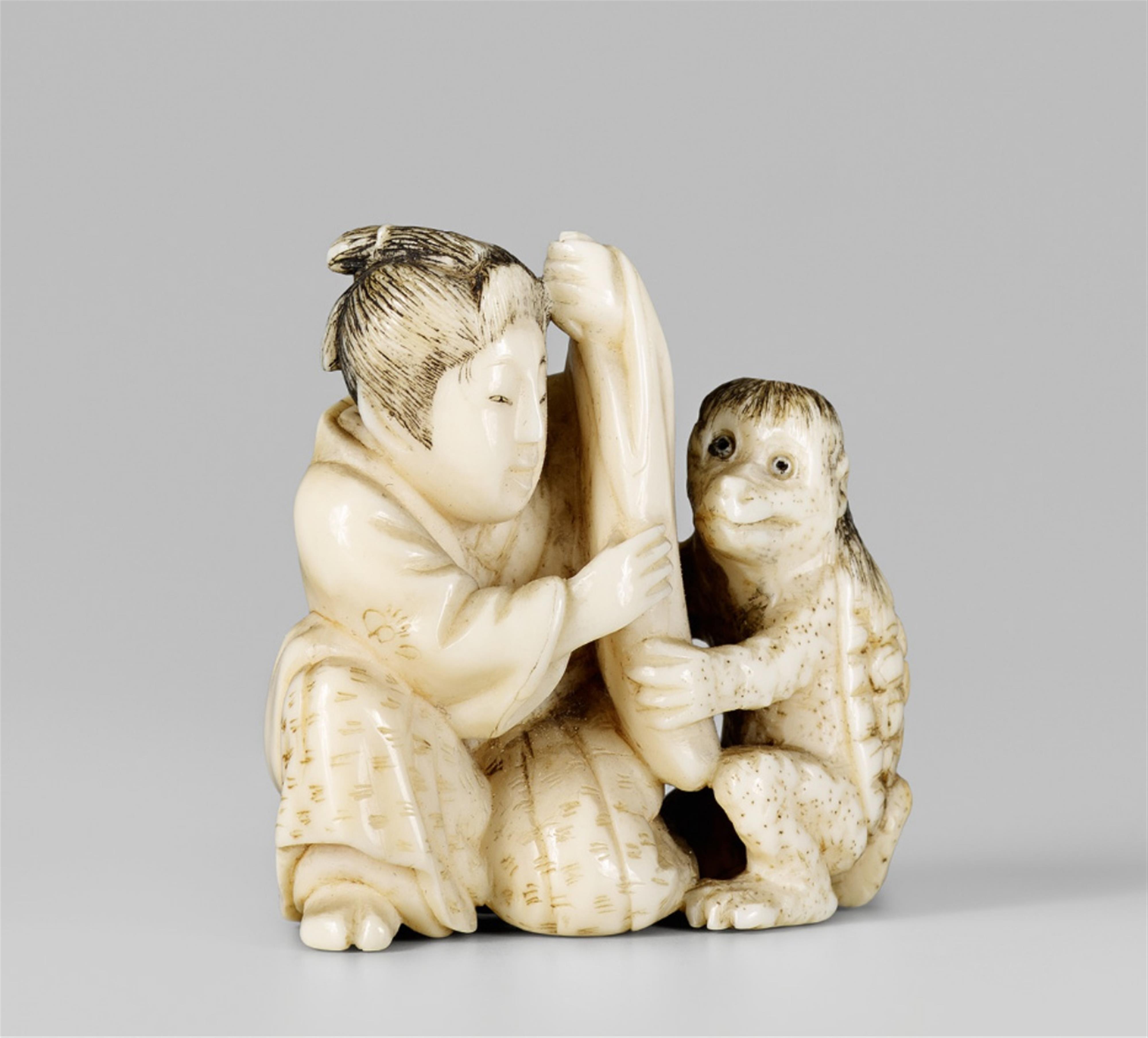 An ivory netsuke of a young man and a kappa, by Tomochika. Late 19th century - image-1