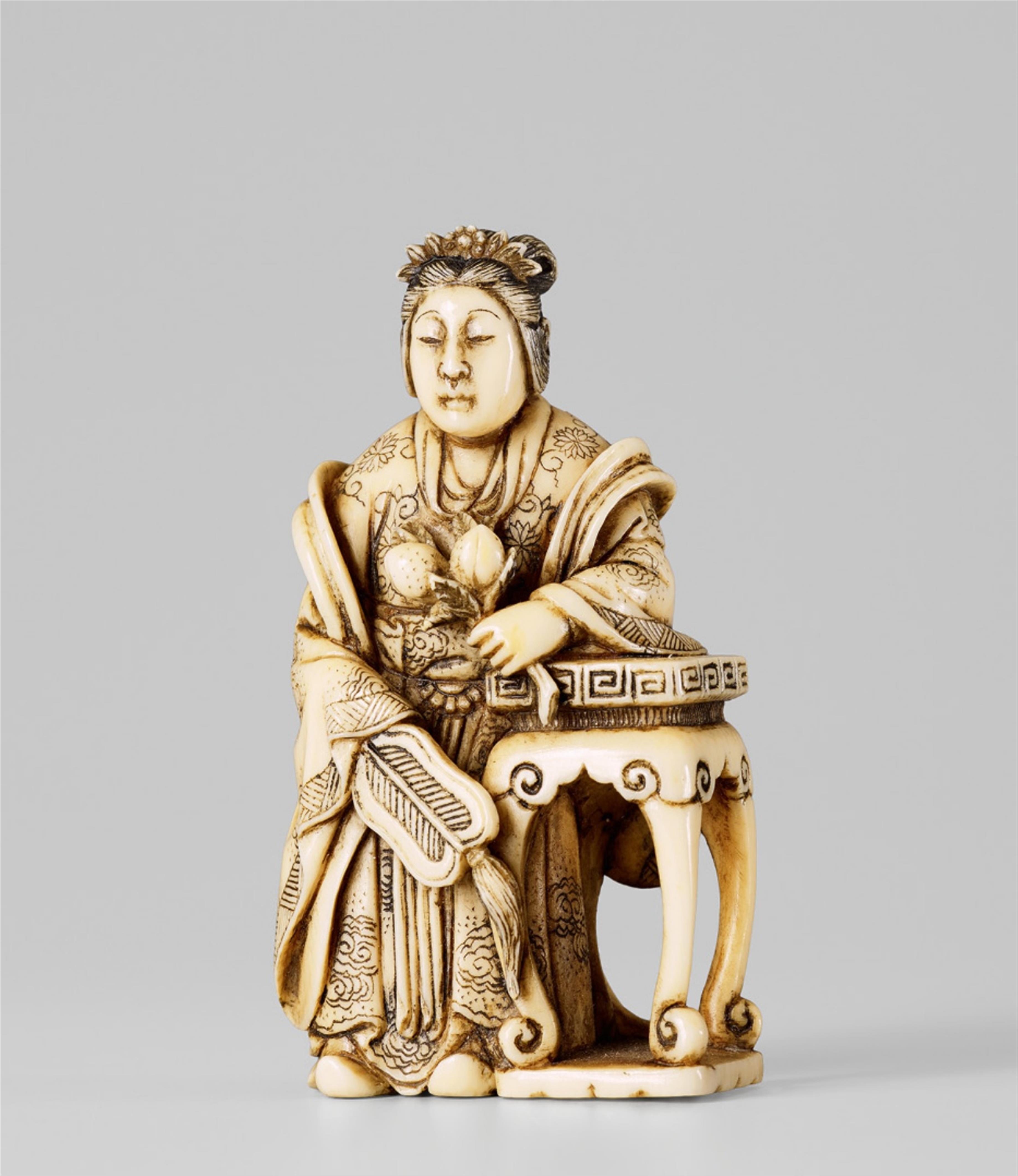 An ivory netsuke of Seiôbo with a peach branch, by Chikuunsai. Second half 19th century - image-1