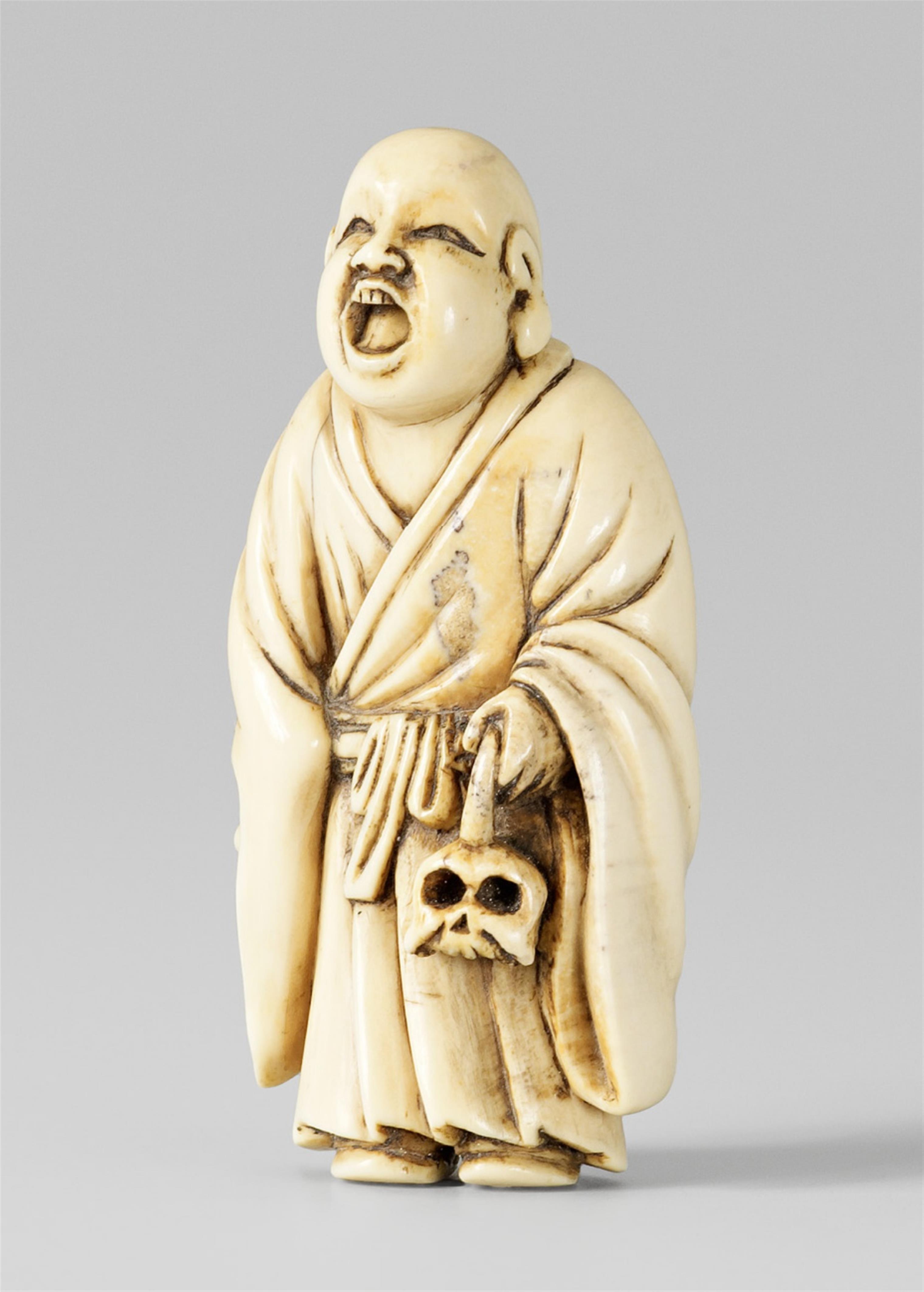 An ivory netsuke of Ikkyû with a skull. Late 19th century - image-1