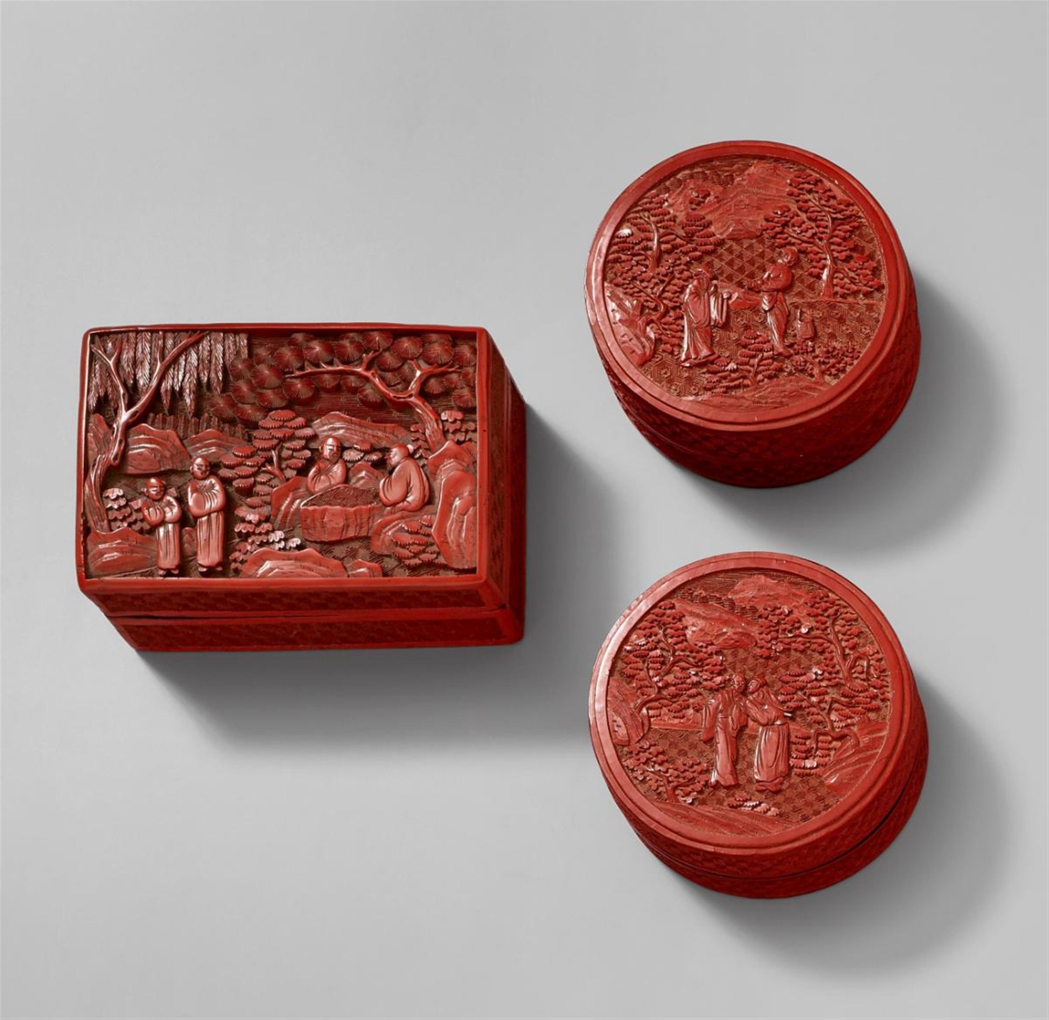 Three covered red lacquer boxes - image-1