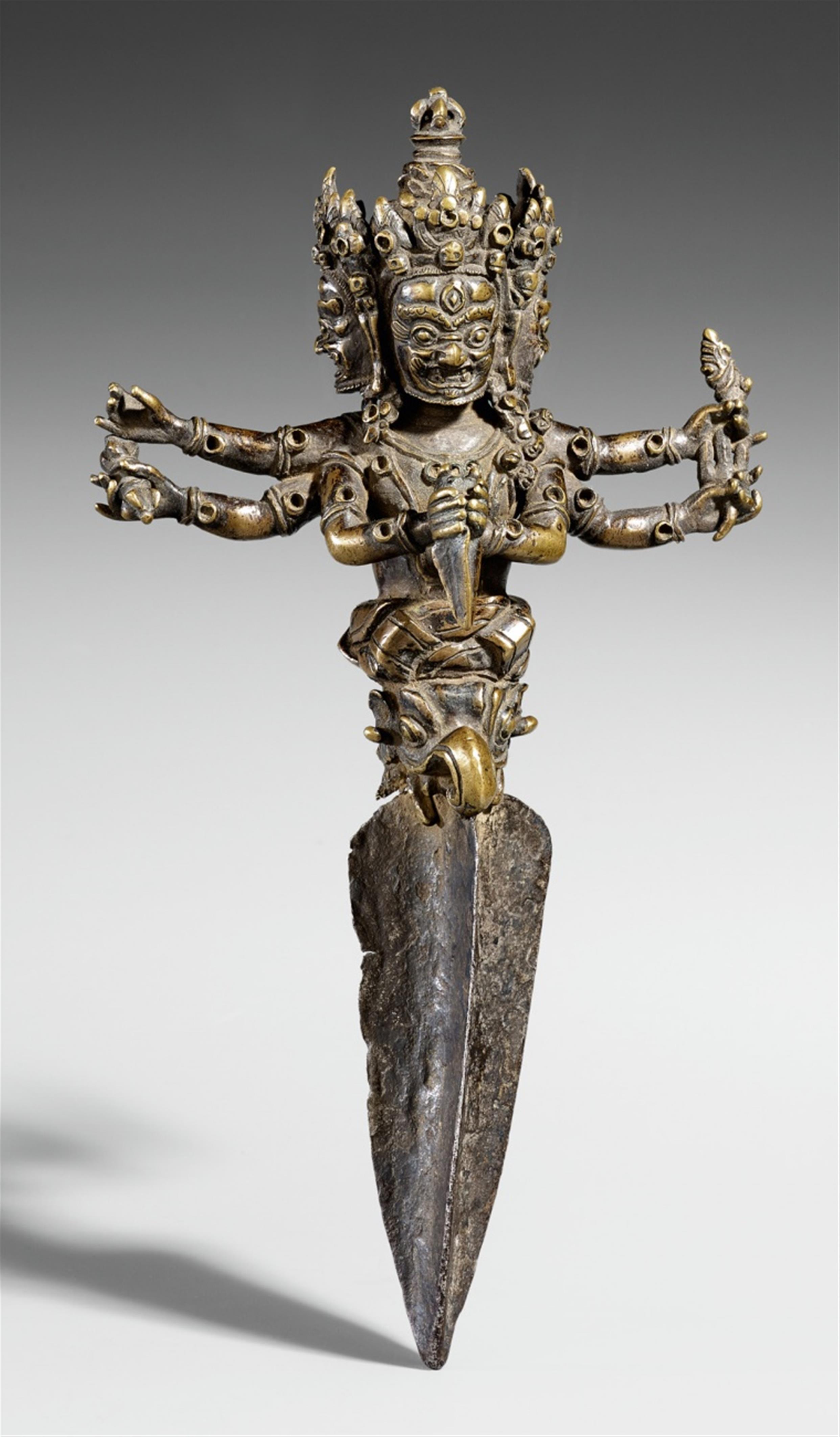 A Tibetan bronze and iron ritual dagger. 17th/18th century - image-1