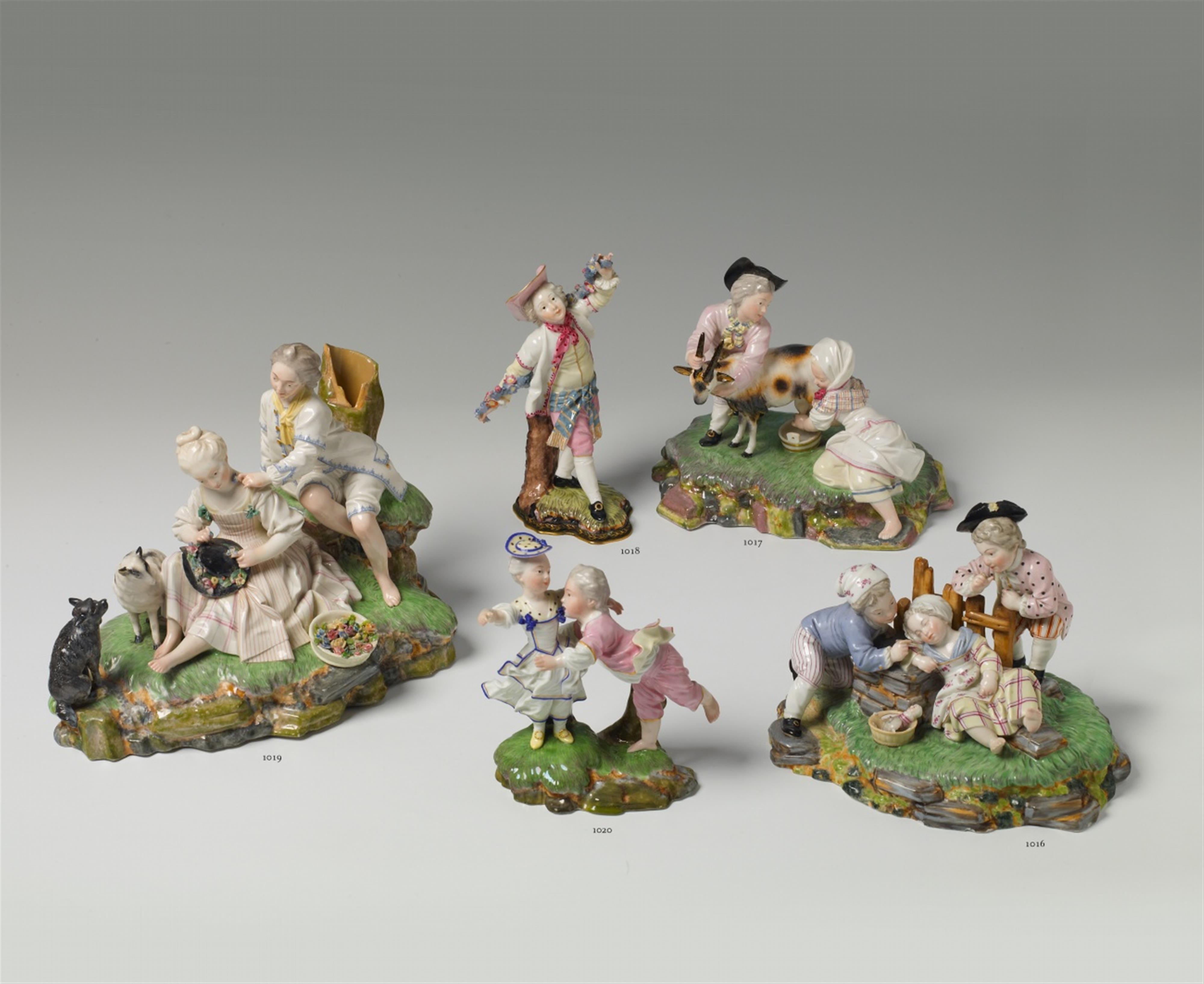 A Höchst porcelain figure of a girl milking a goat. - image-1