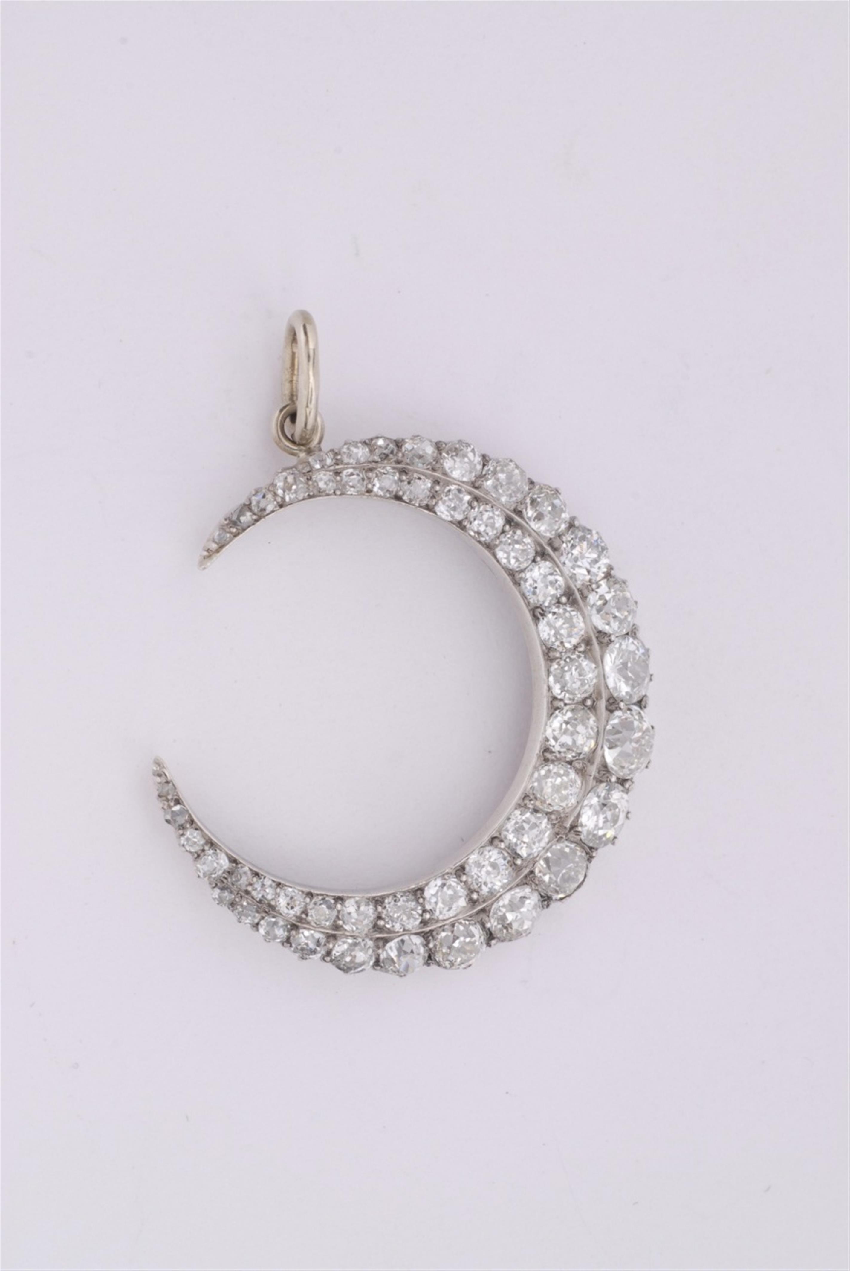 A silver Belle Epoque moon pendant. - image-1