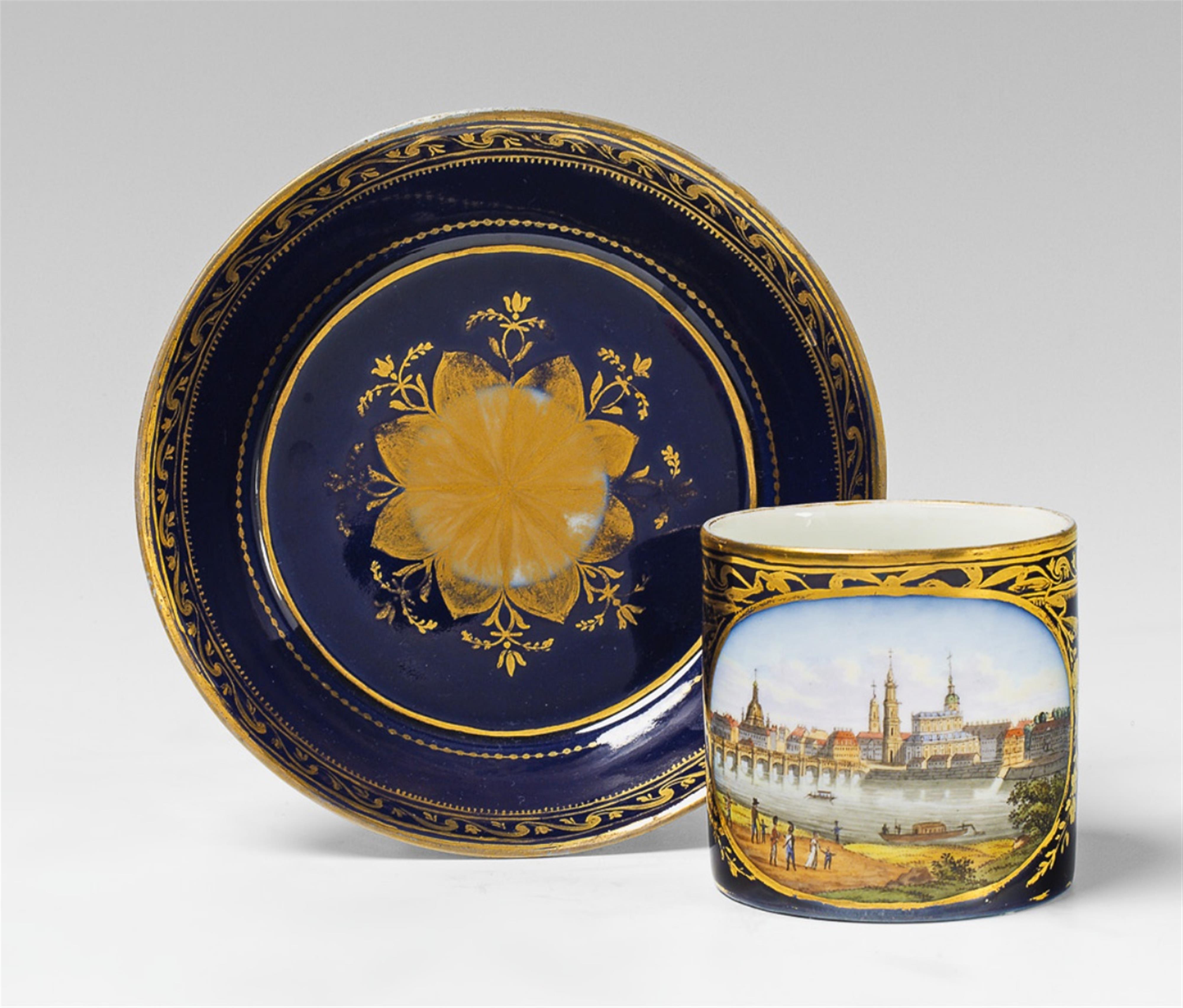 A Meissen porcelain teacup and saucer with a view of Dresden. - image-1
