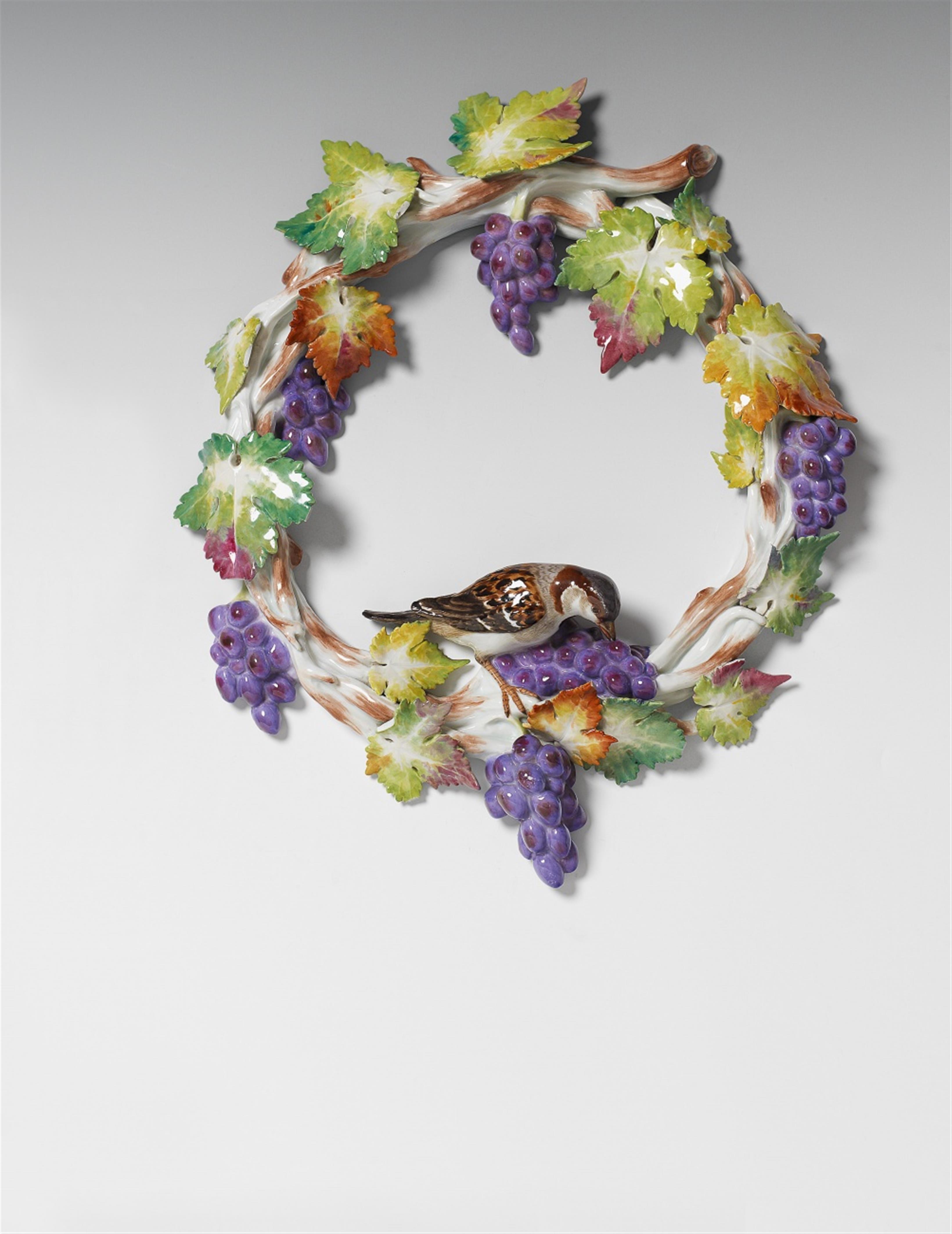 A Meissen porcelain vine wreath with a bird. - image-1