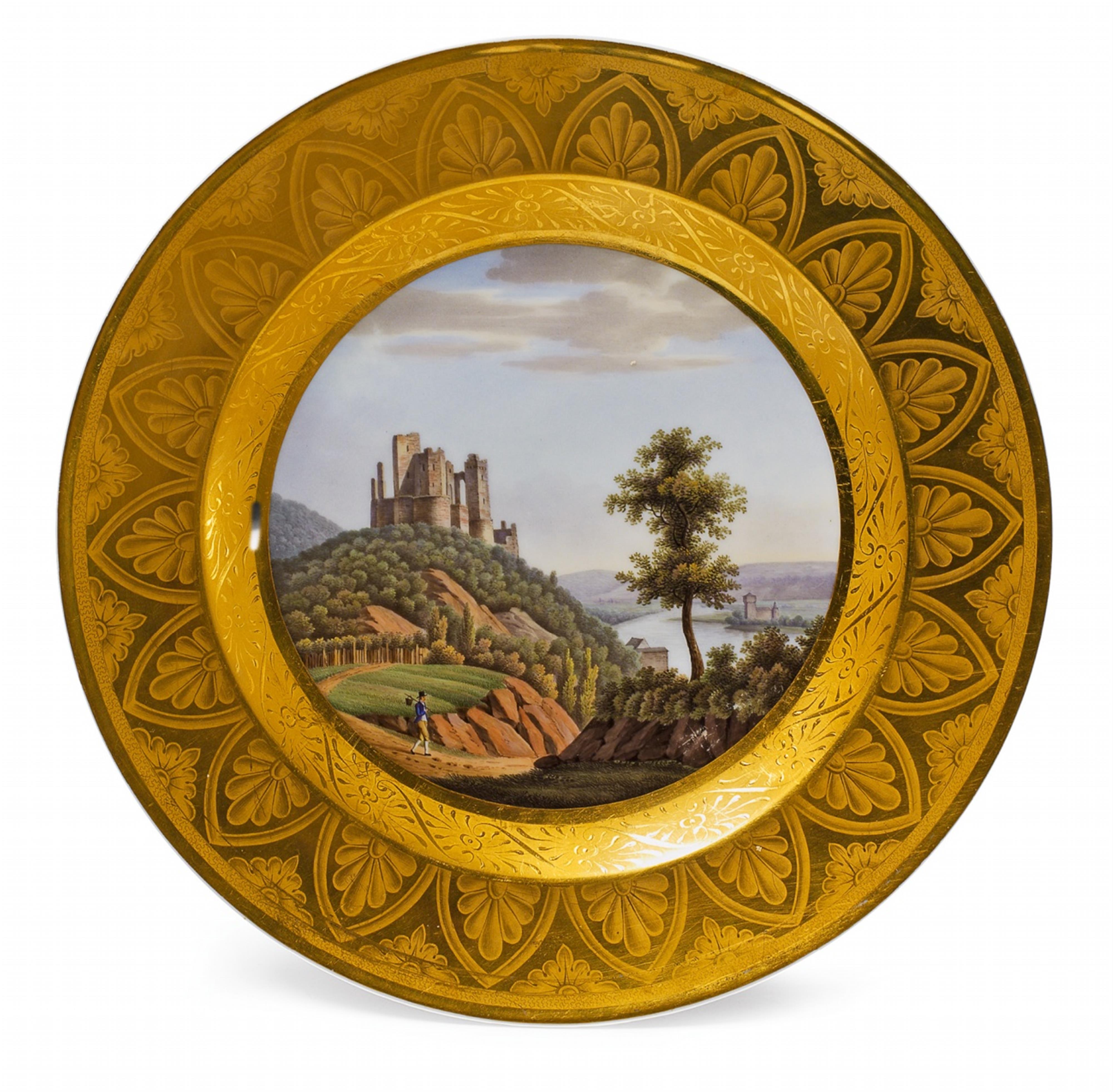 A Berlin KPM porcelain plate with the ruins of Stolzenfels Castle. - image-1