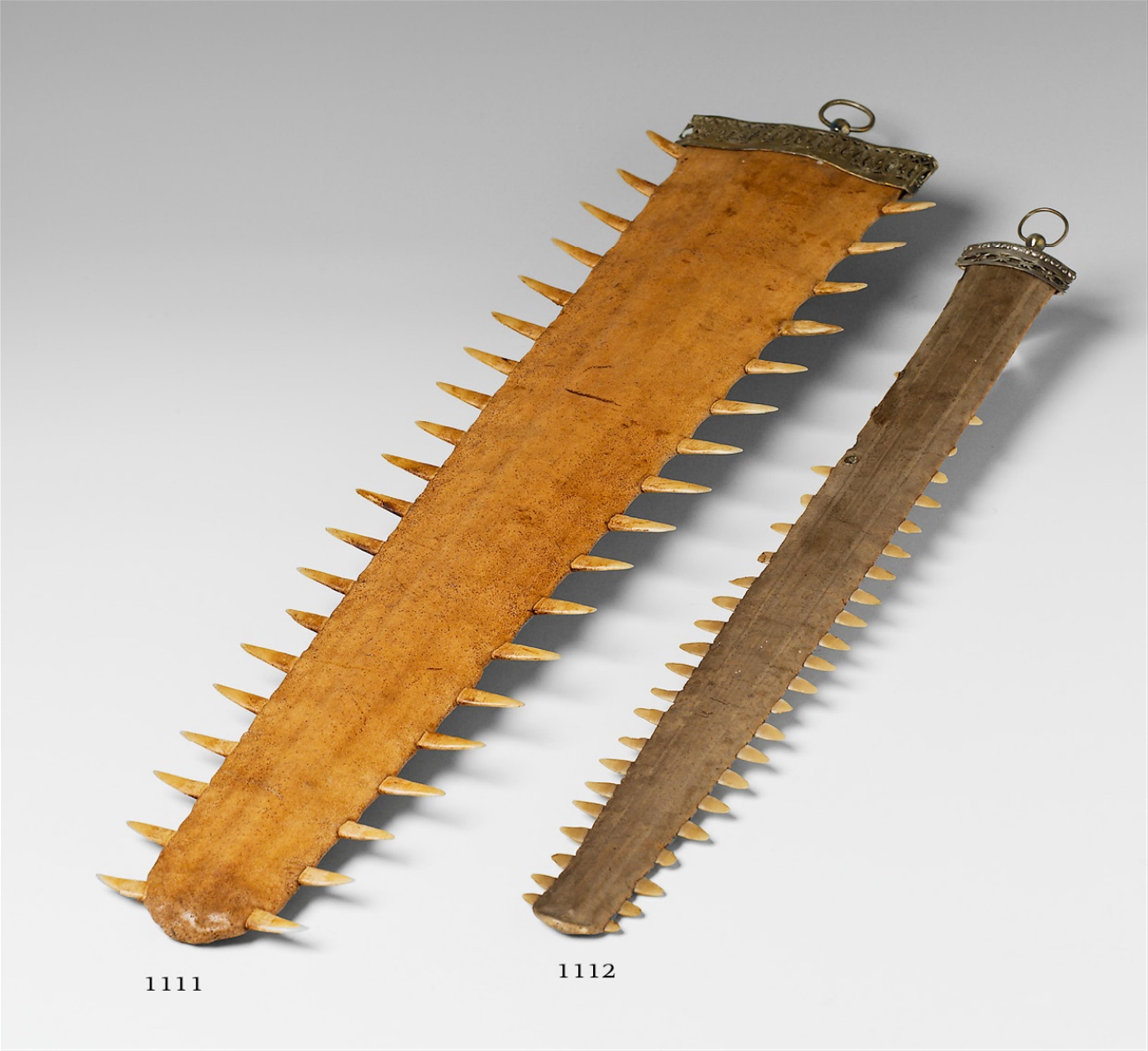 A brass mounted preserved sawfish bone. - image-1