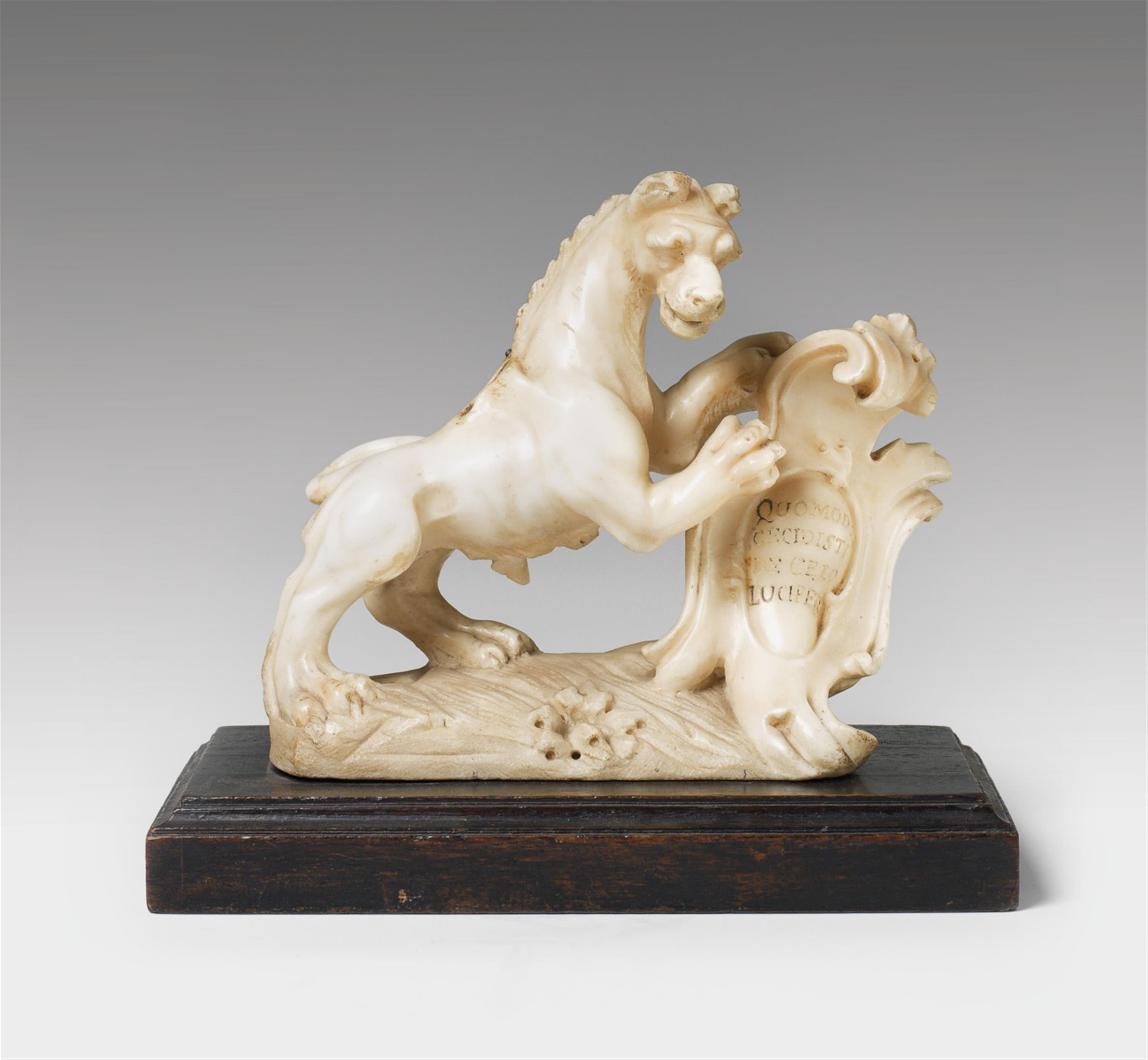 An Italian alabaster figure of a chimaera supporting a motto. - image-1
