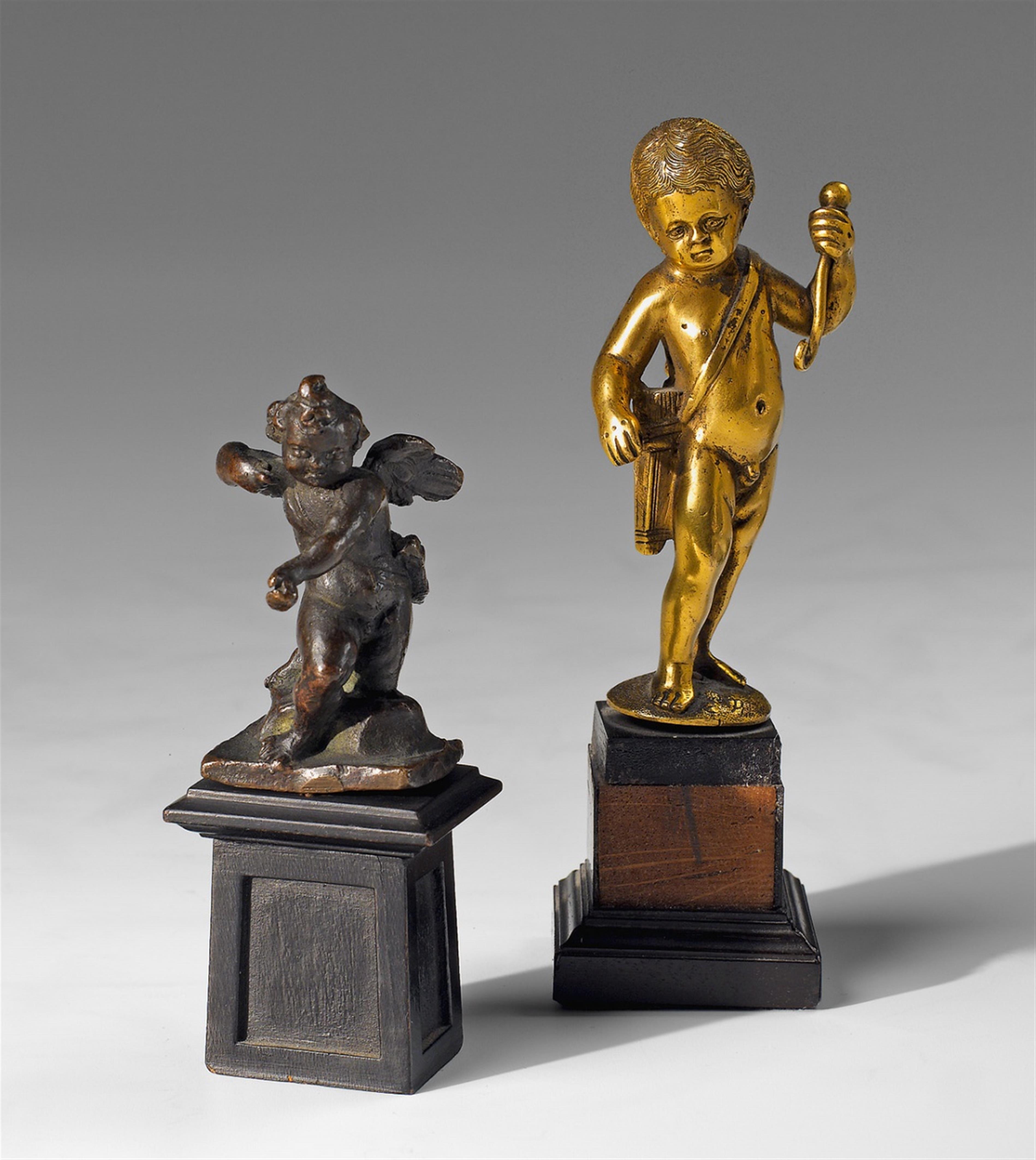 Two small, bronze figures of putti. - image-1