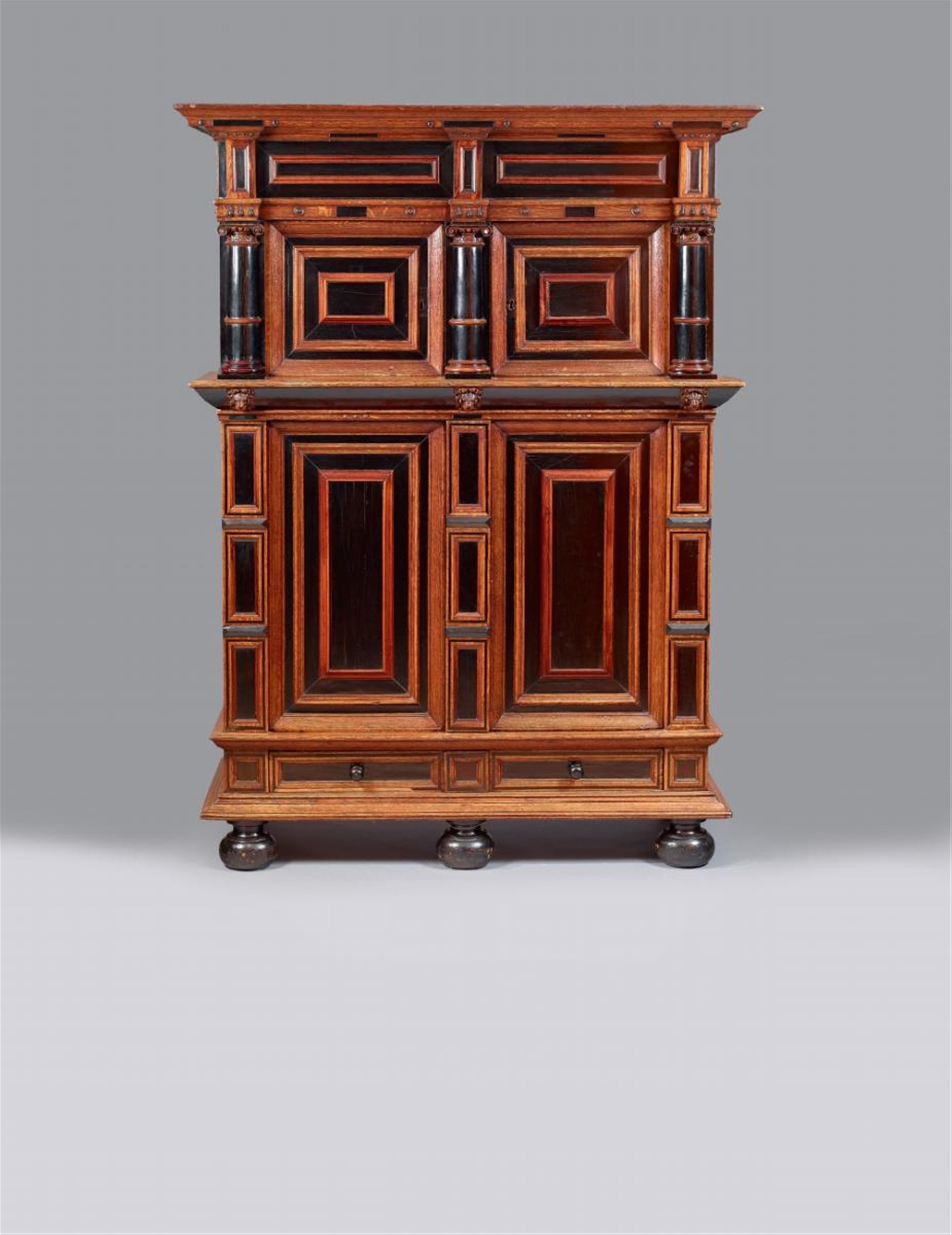 An ebony veneered and carved oak "Nederlandse kast" architectural cabinet. - image-1