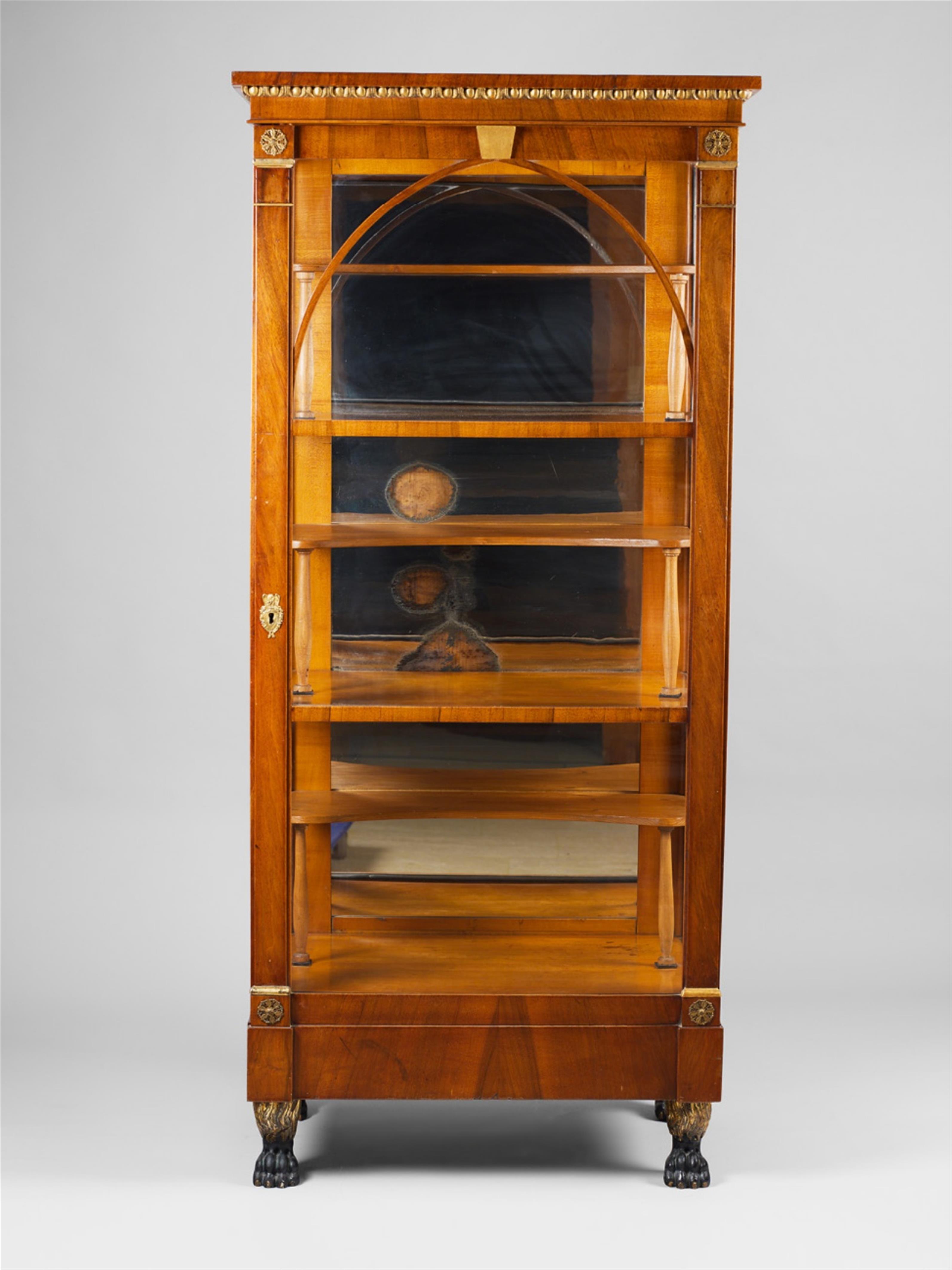 An Austrian Biedermeier ormolu mounted cherrywood display cabinet. - image-1