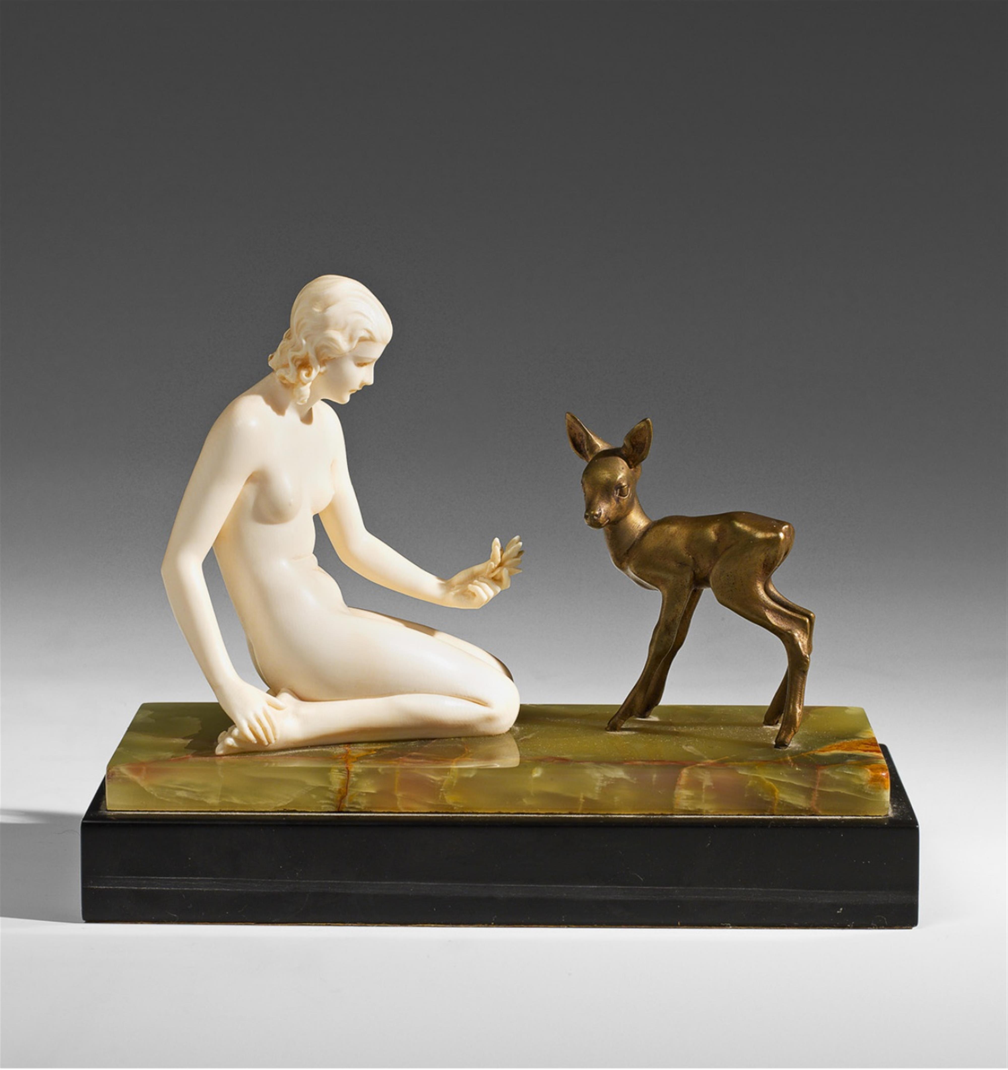 A Berlin cryselephantine figure of a woman with a fawn. - image-1