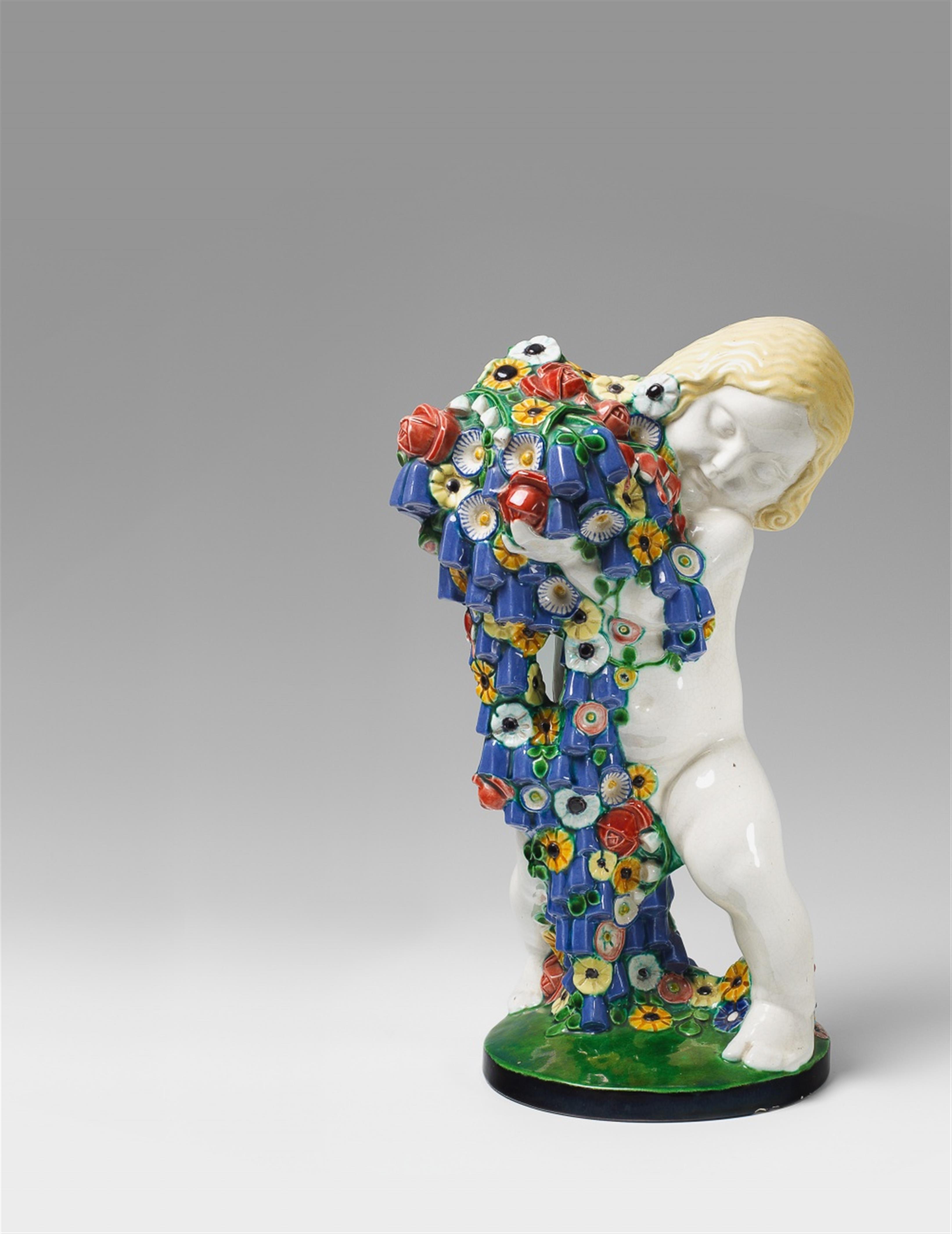 A Vienna ceramic figure of a putto as an allegory of spring. - image-1