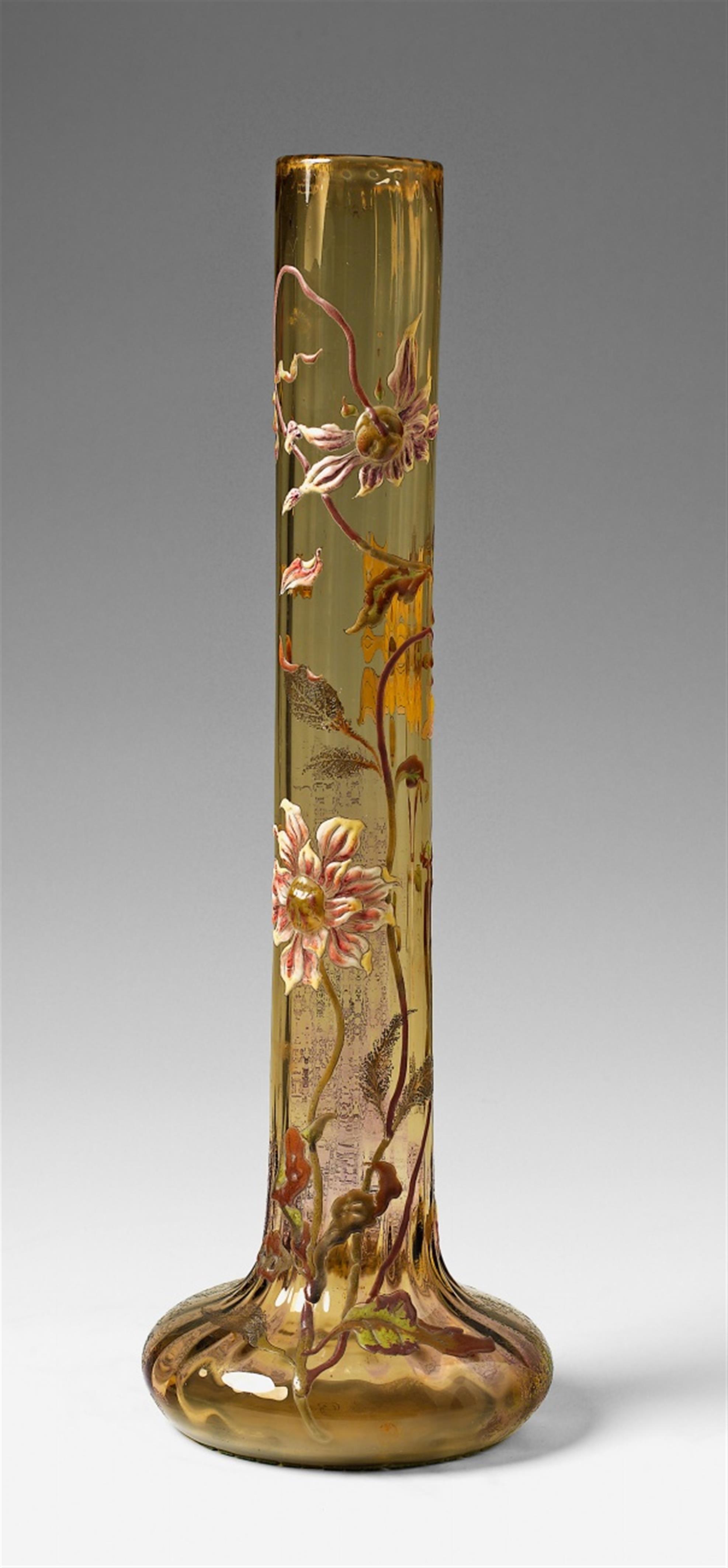 A Gallé glass vase with enamelled and gilt crysanthemum decor. - image-1