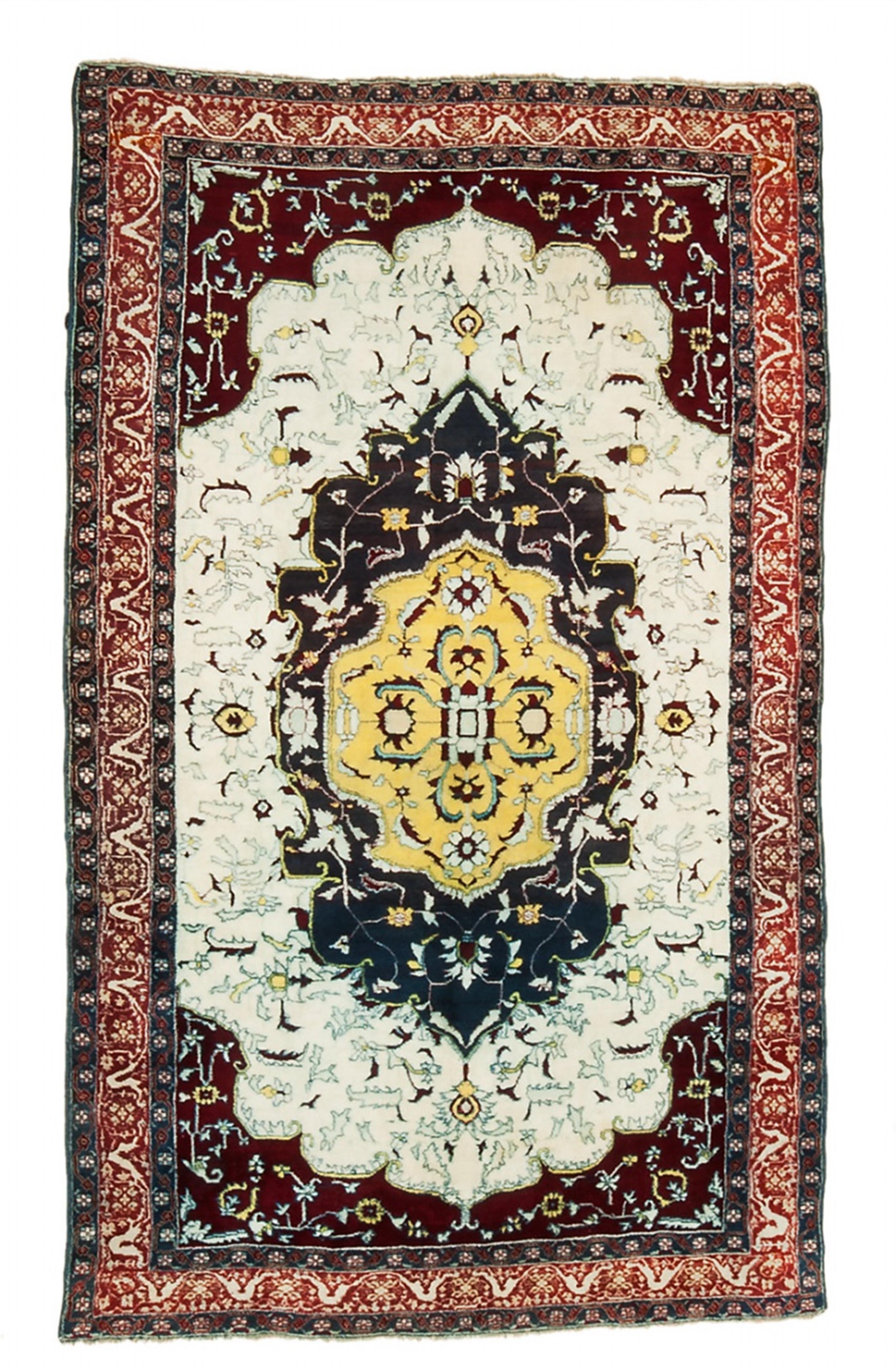 A small Indian medallion Agra carpet - image-1