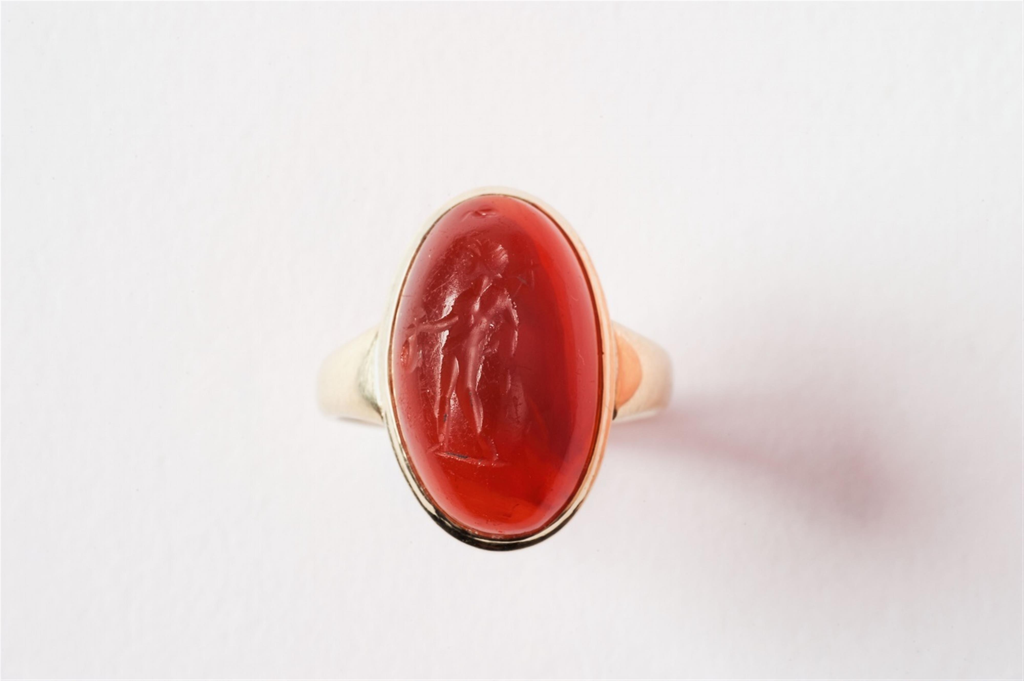 A 14k gold ring with a Roman intaglio. - image-1