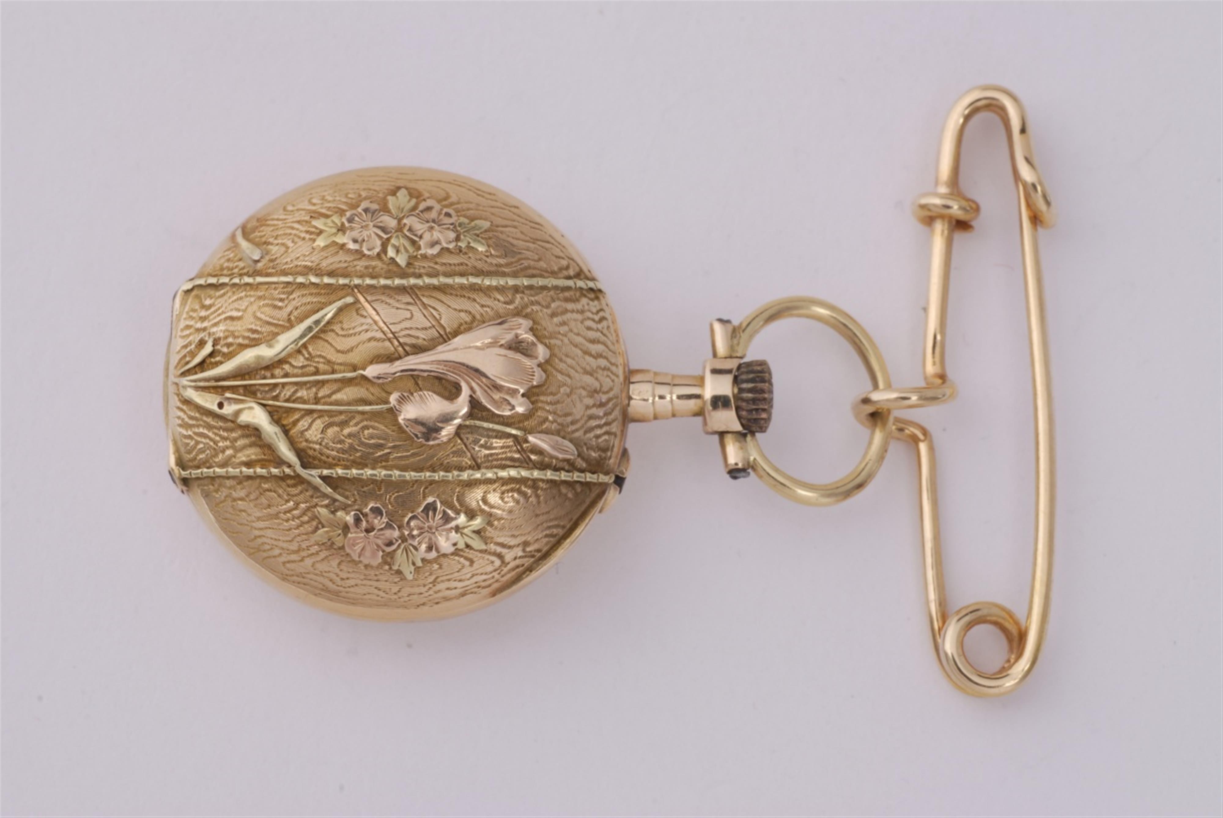 An 18k gold pin brooch suspending an Art Nouveau pendant watch. - image-2