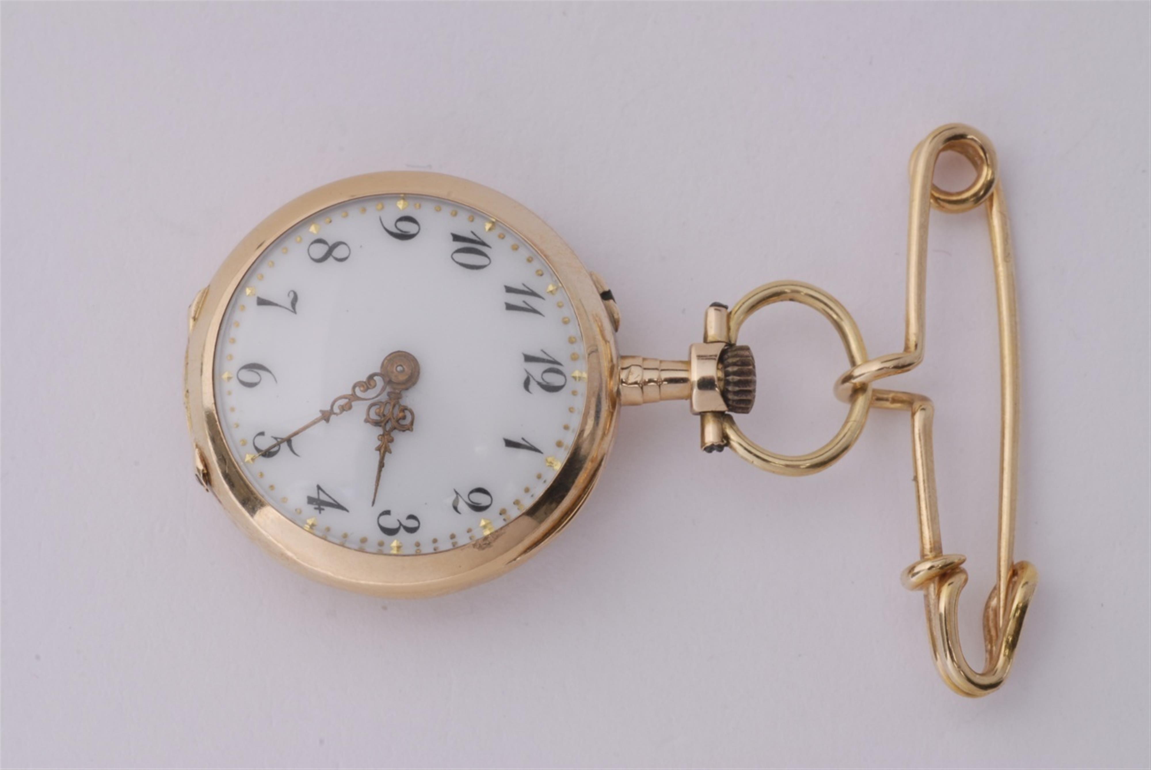 An 18k gold pin brooch suspending an Art Nouveau pendant watch. - image-1