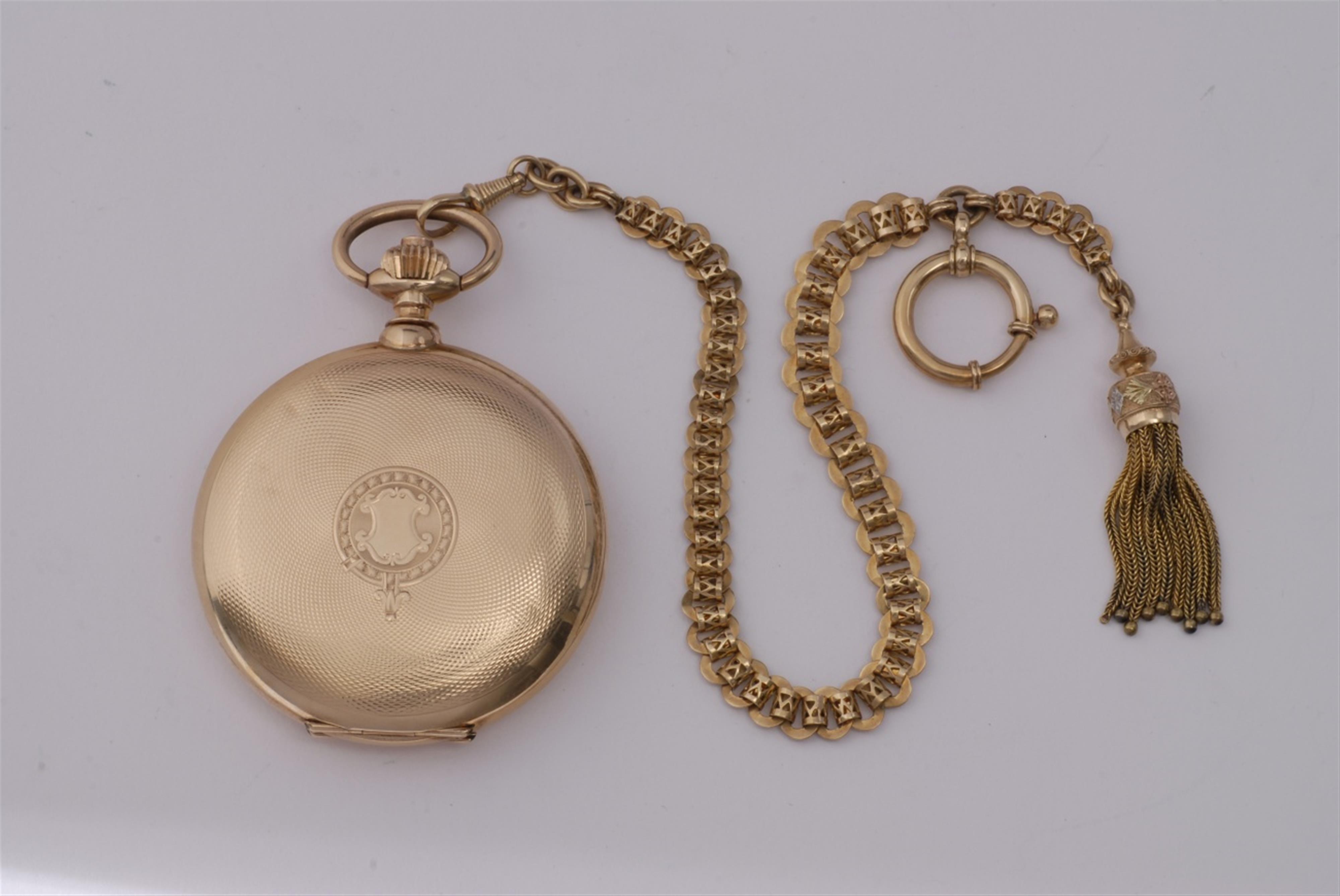 A 14k red gold Swiss hunter pocketwatch and chain. - image-1