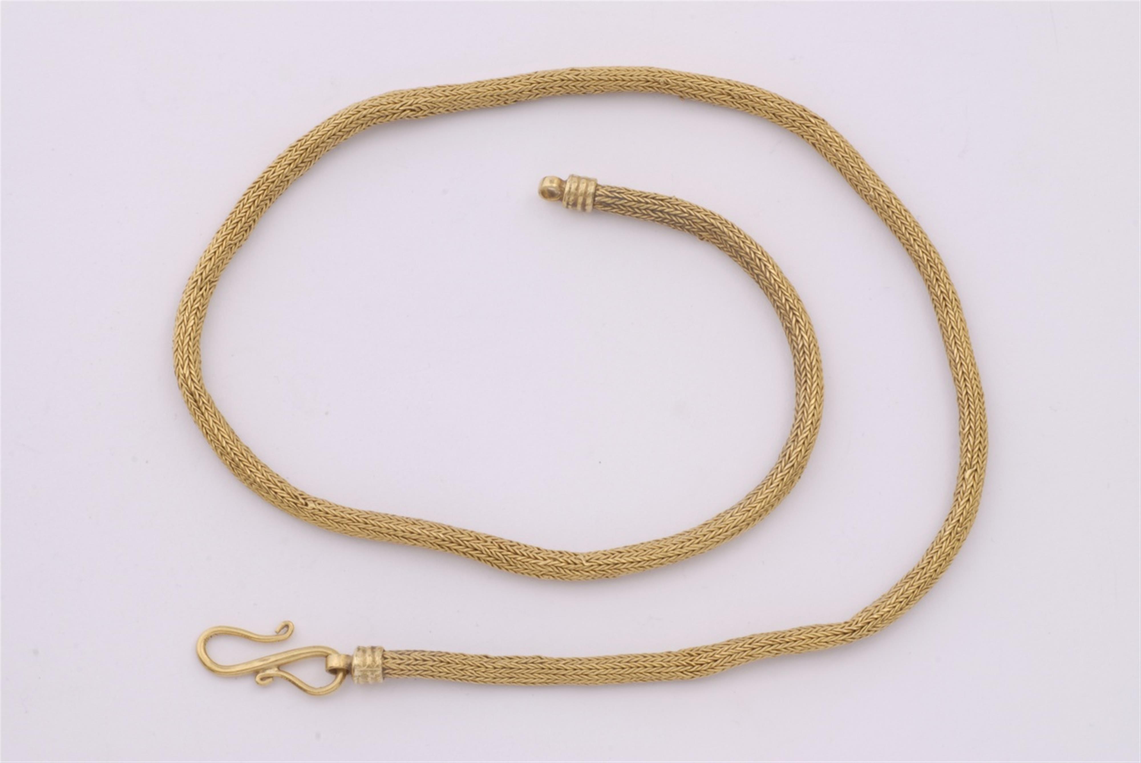 A hand-forged, fine gold chain necklace. - image-1